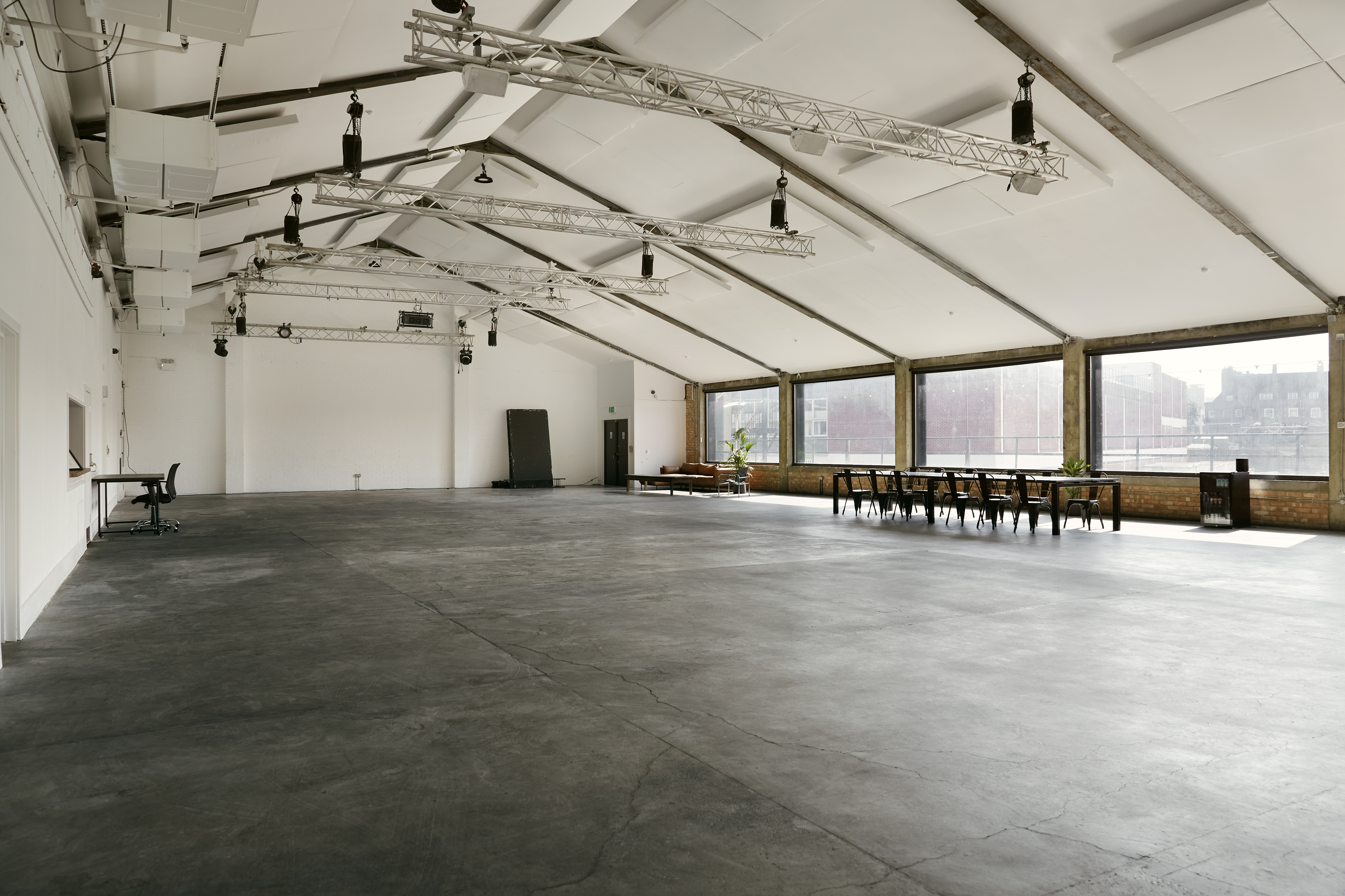 Spacious Lock Warehouse venue with high ceilings for versatile events and gatherings.