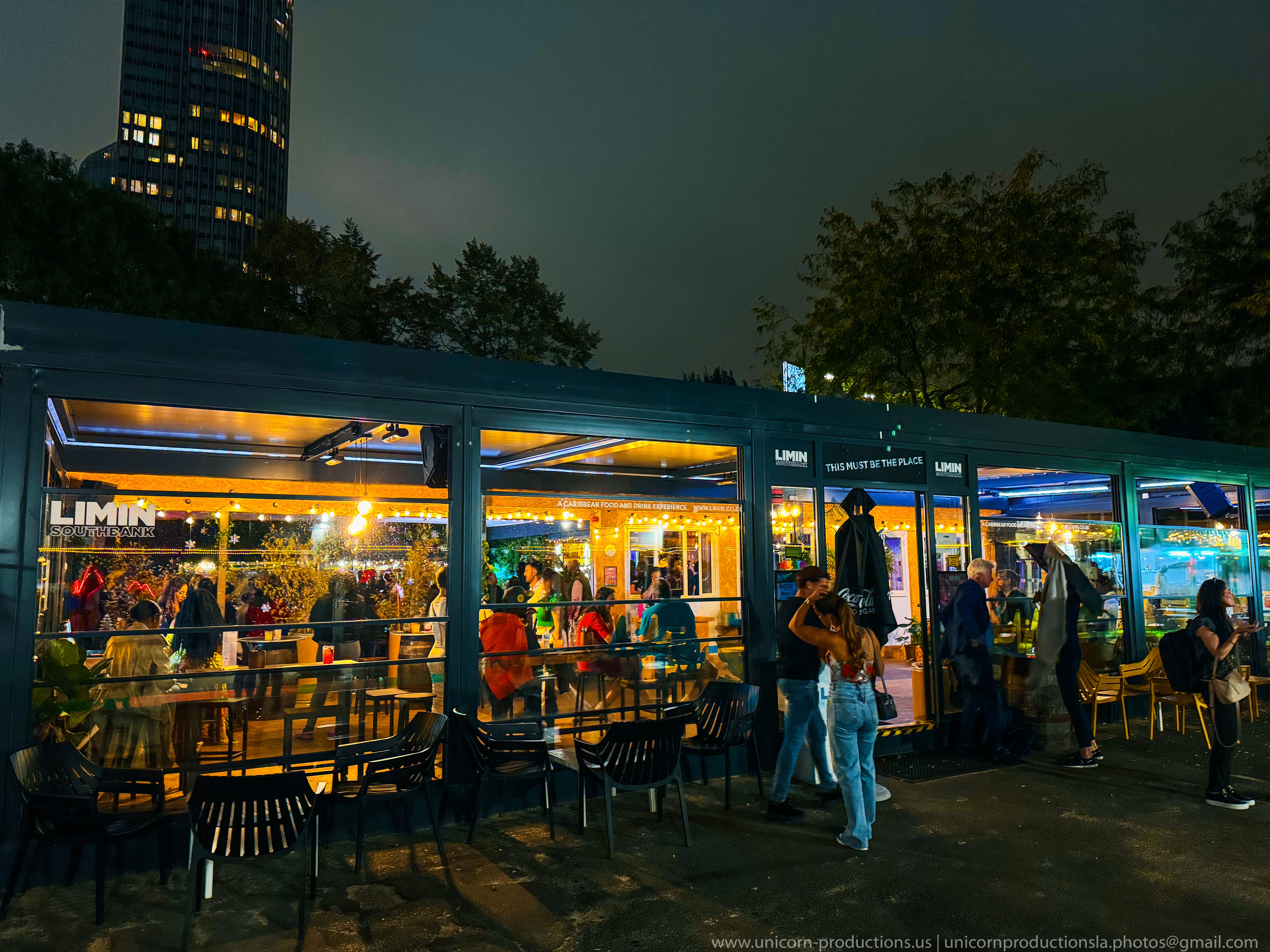 L'Chalet Southbank outdoor venue with warm lighting for networking events and gatherings.