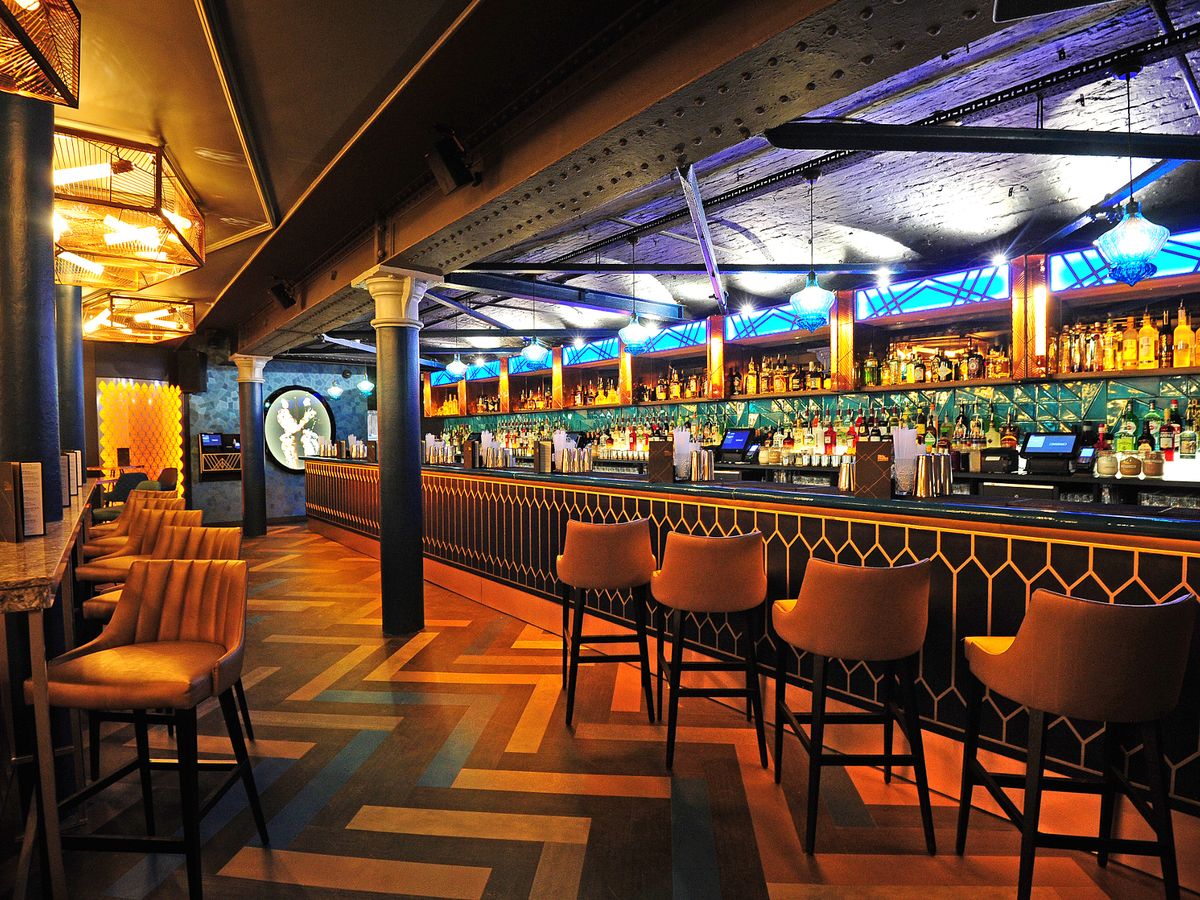 Stylish Ground Floor Bar in Dirty Martini Manchester, ideal for networking and cocktail events.