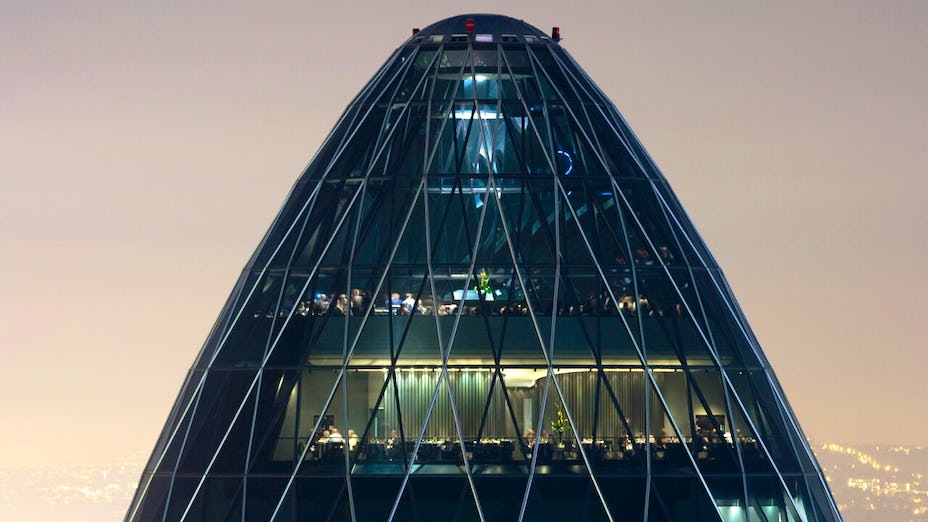 New Year's Eve event at Searcys in the Gherkin, featuring a modern glass skyscraper.