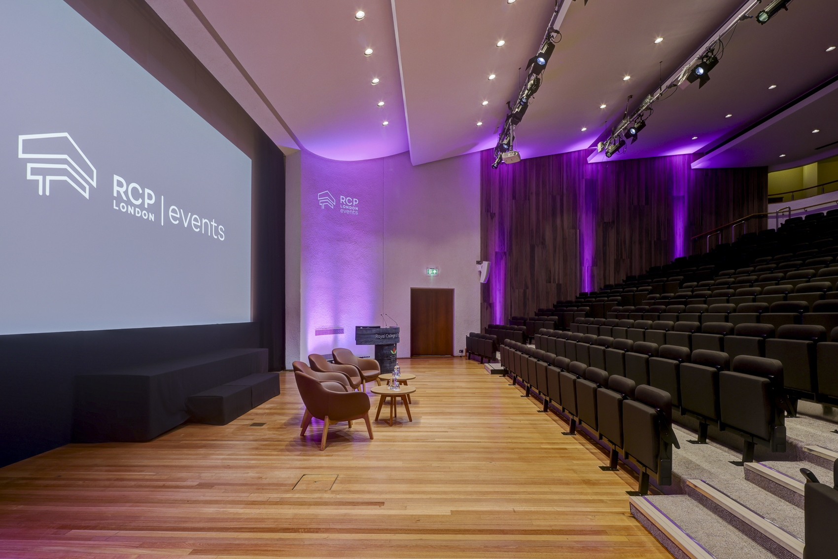 Wolfson Theatre at RCP London: modern event space with sleek stage and purple accents.