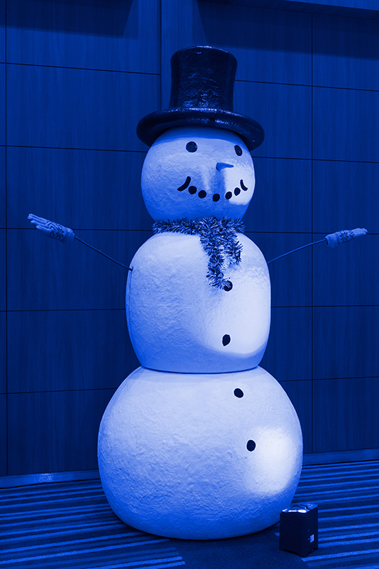 Cheerful snowman decoration for London Suite Christmas party winter events.