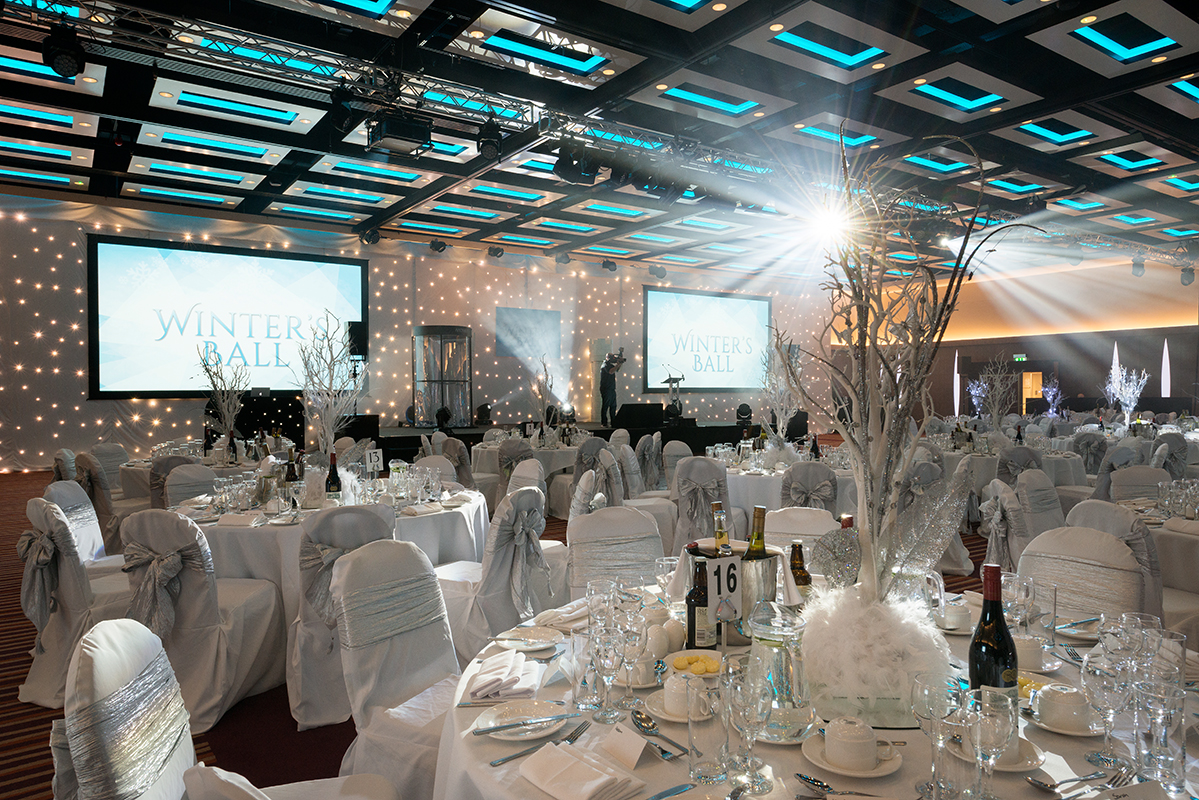 Elegant banquet hall for London Suite Christmas Party with sophisticated table arrangements.