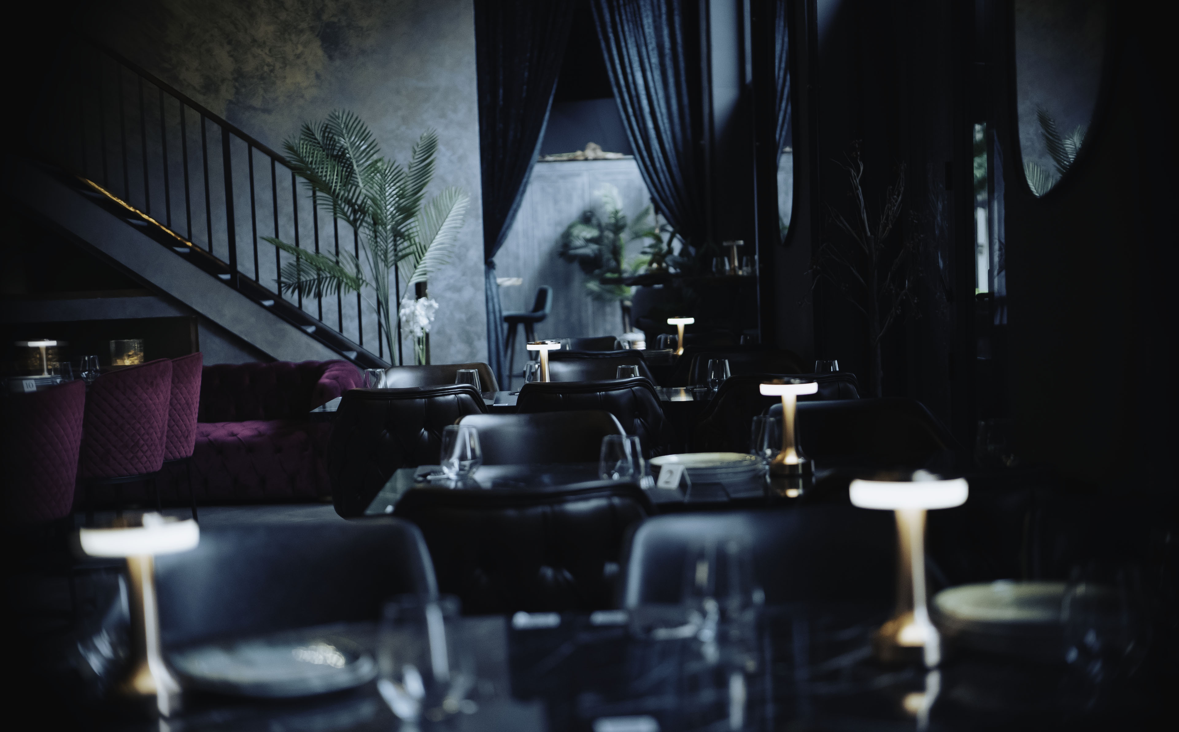 Sophisticated dining space at Kaboom Lounge, perfect for upscale events and gatherings.