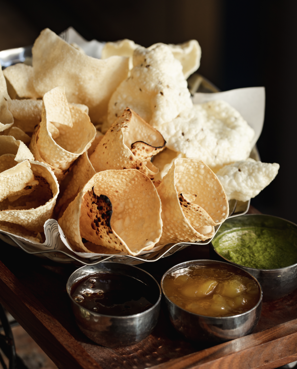 Private dining platter of crispy snacks at Bombay Delight for events and gatherings.