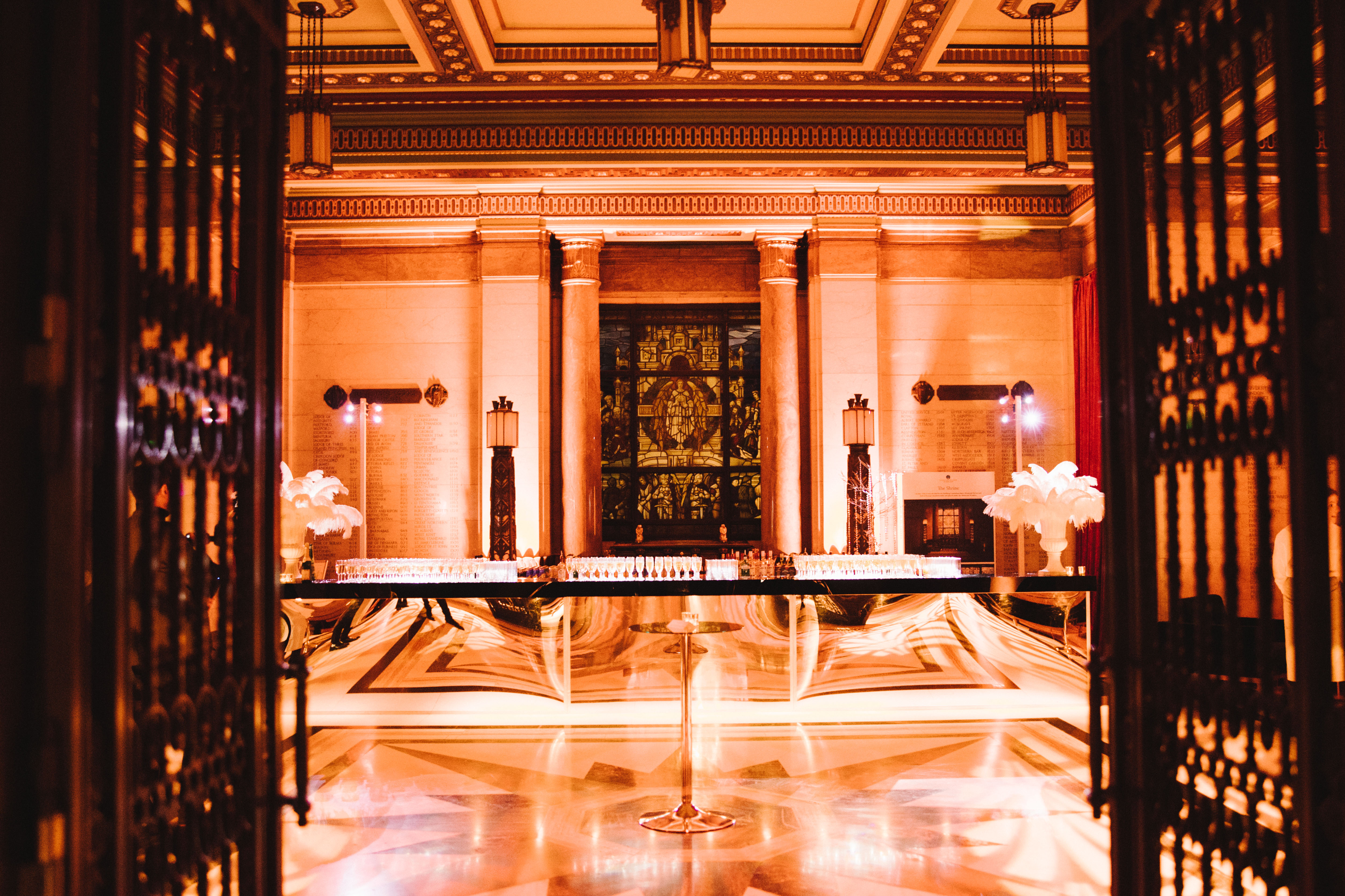 Historic venue foyer, grand reception table, corporate event, gala