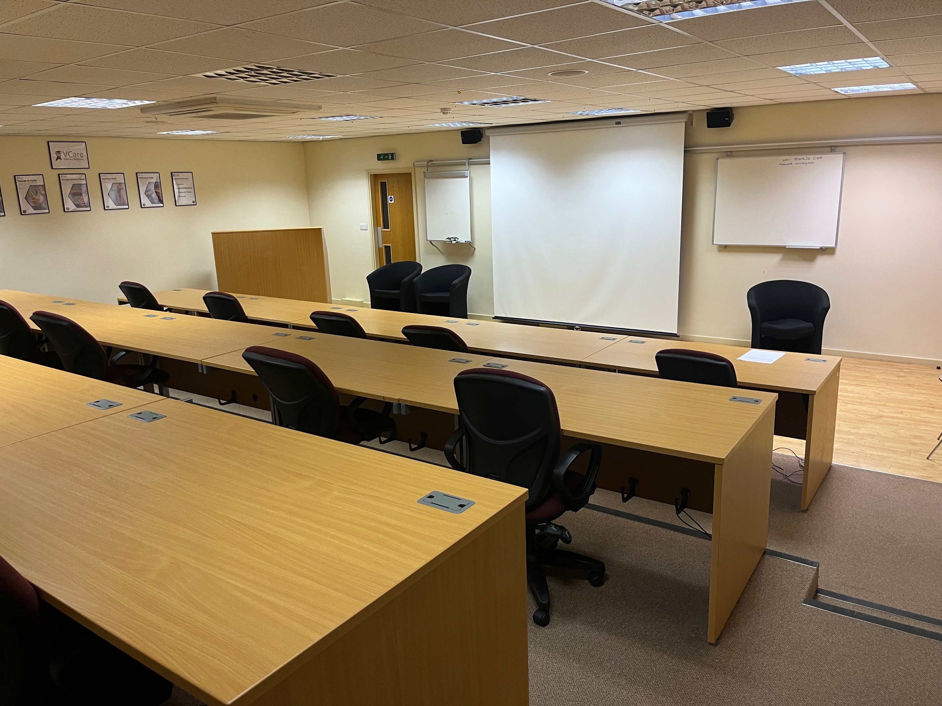 Auditorium/Boardroom at Vcare24 with ergonomic chairs for workshops and training sessions.