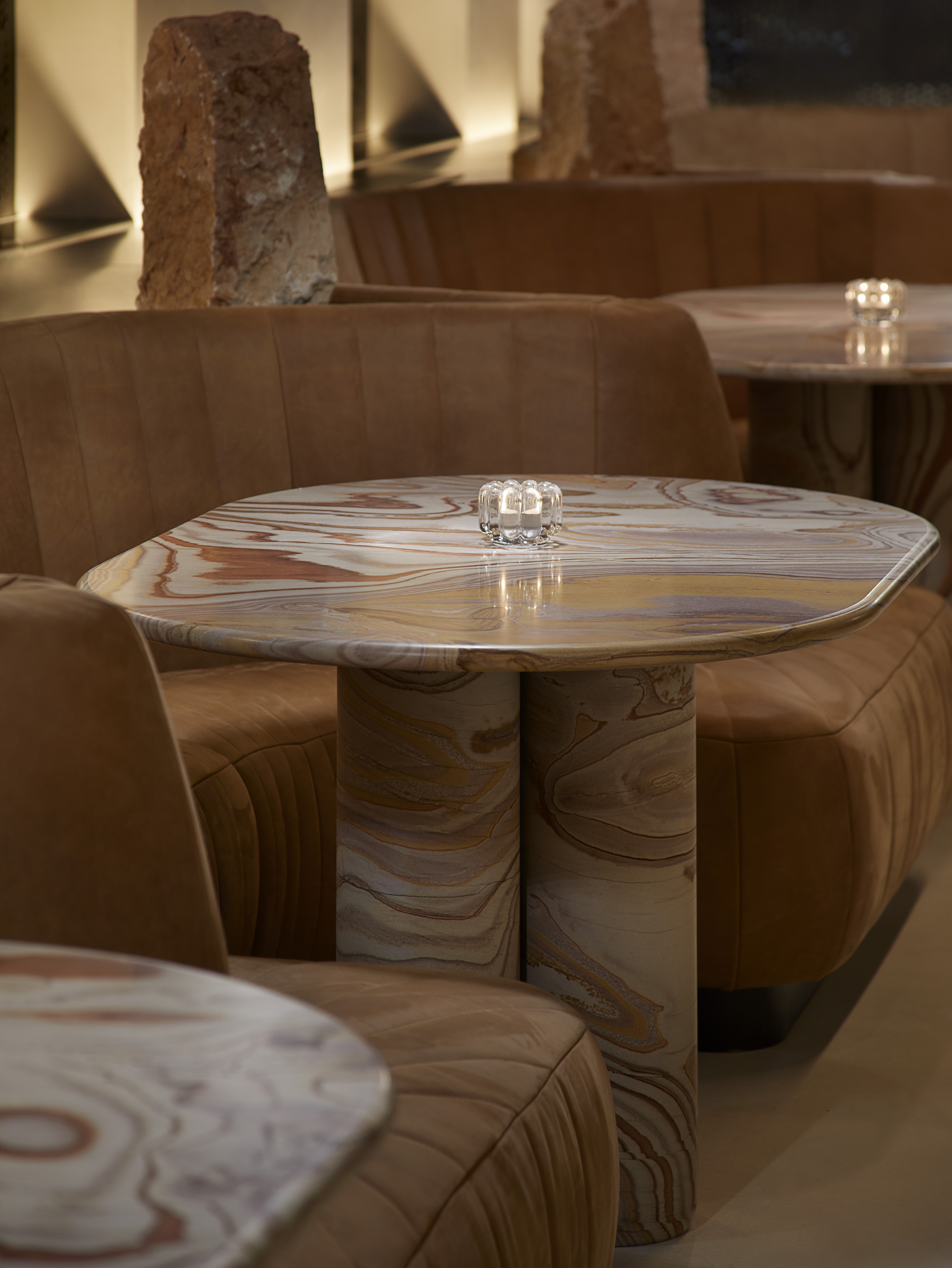 Stylish marbled table in Silverleaf lounge, perfect for networking events and meetings.