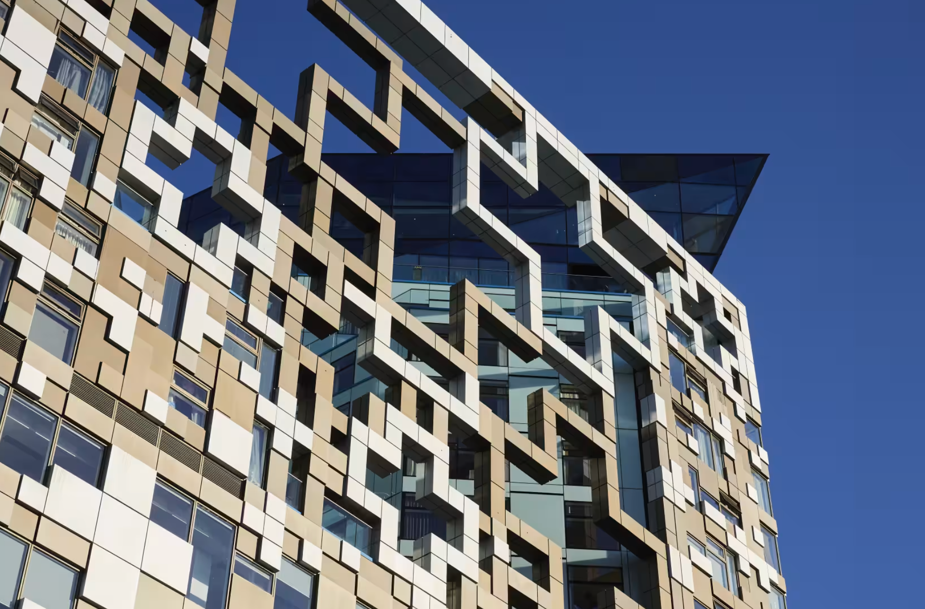 The Champagne Room at The Cube Hotel: modern venue with geometric glass design for events.