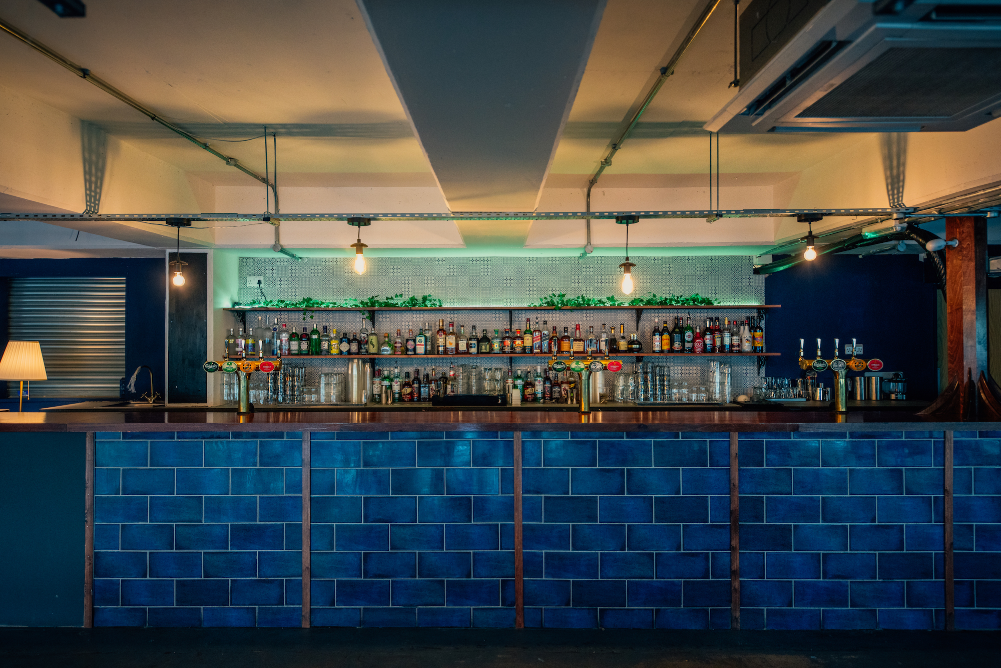 Stylish bar at The Gig Space, Peckham Levels, ideal for networking events and social gatherings.