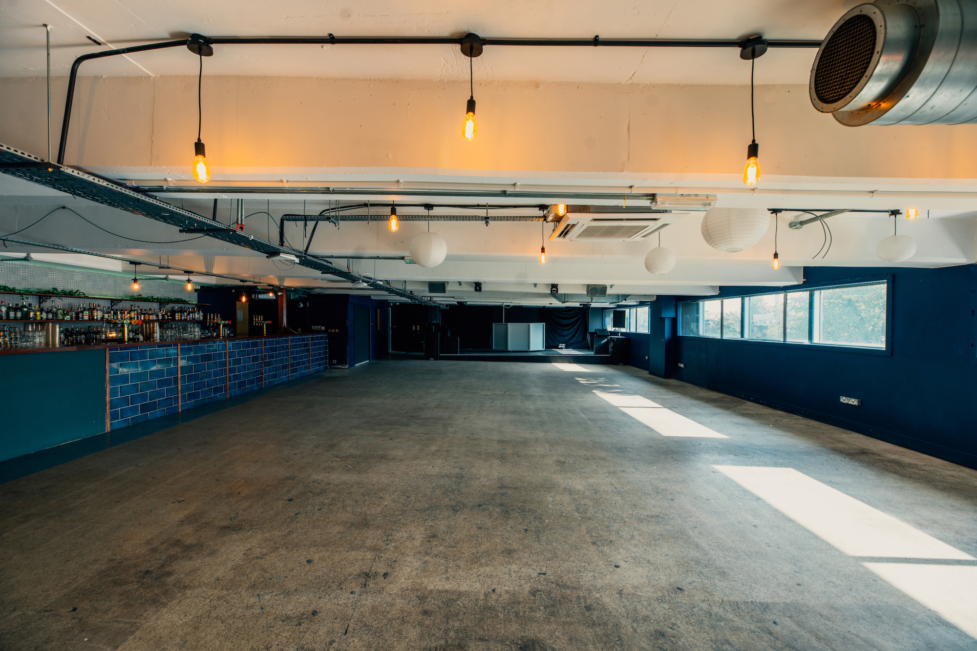 Versatile event space in Peckham Levels with natural light, ideal for networking and receptions.