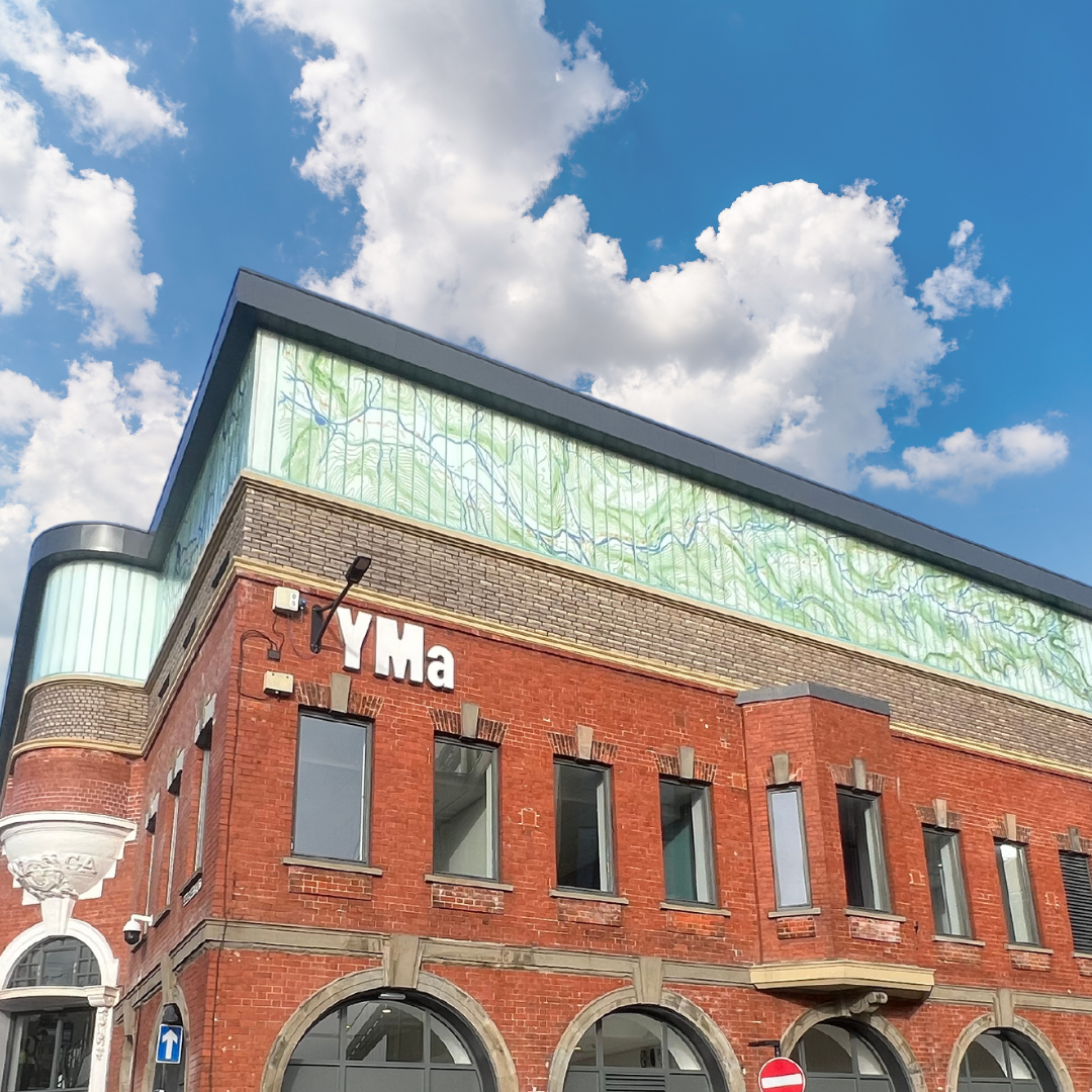 Modern venue with striking brick and glass design, perfect for corporate events and workshops.