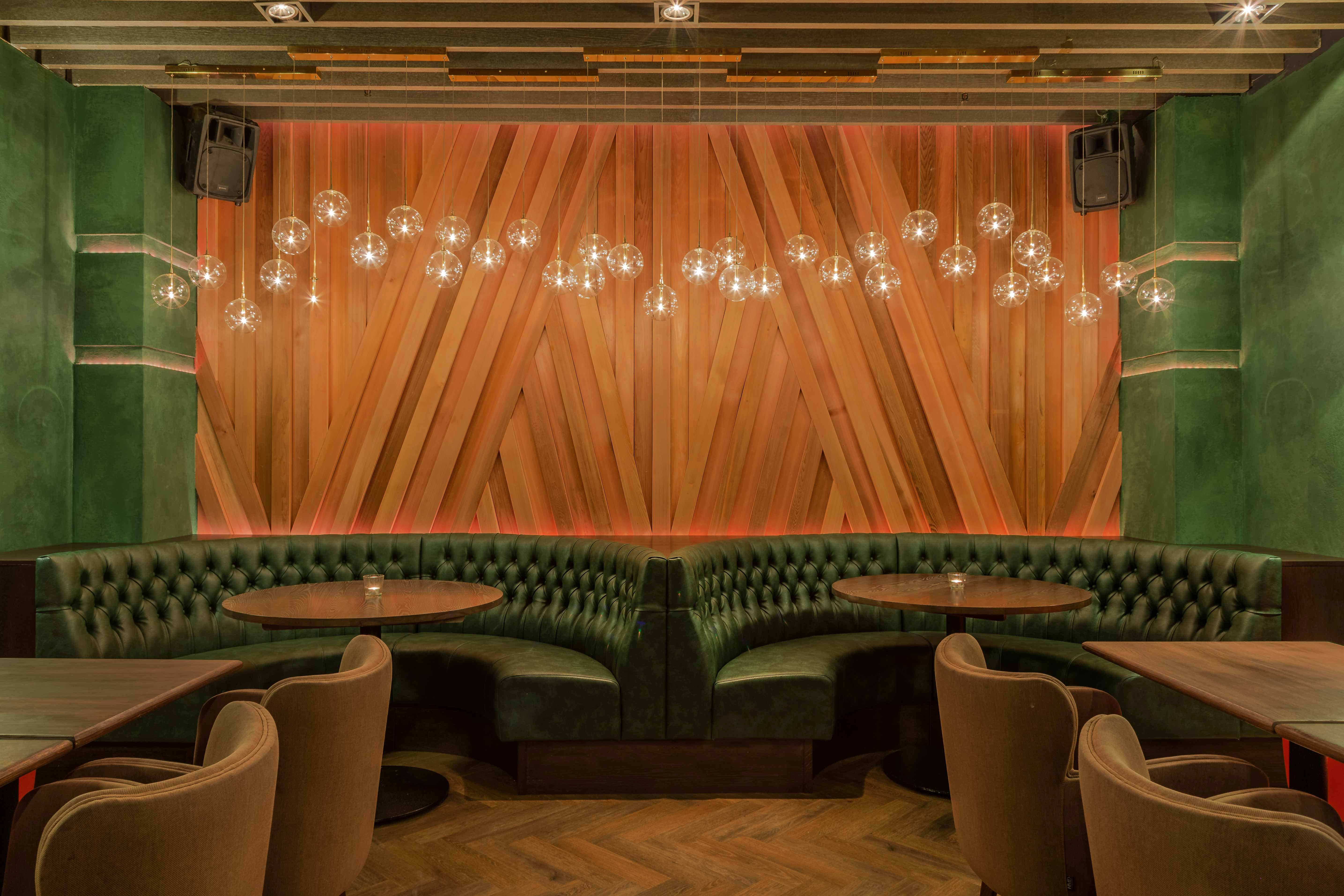 Exclusive Restaurant Hire in Ayllu, cozy venue with warm wood accents for networking events.