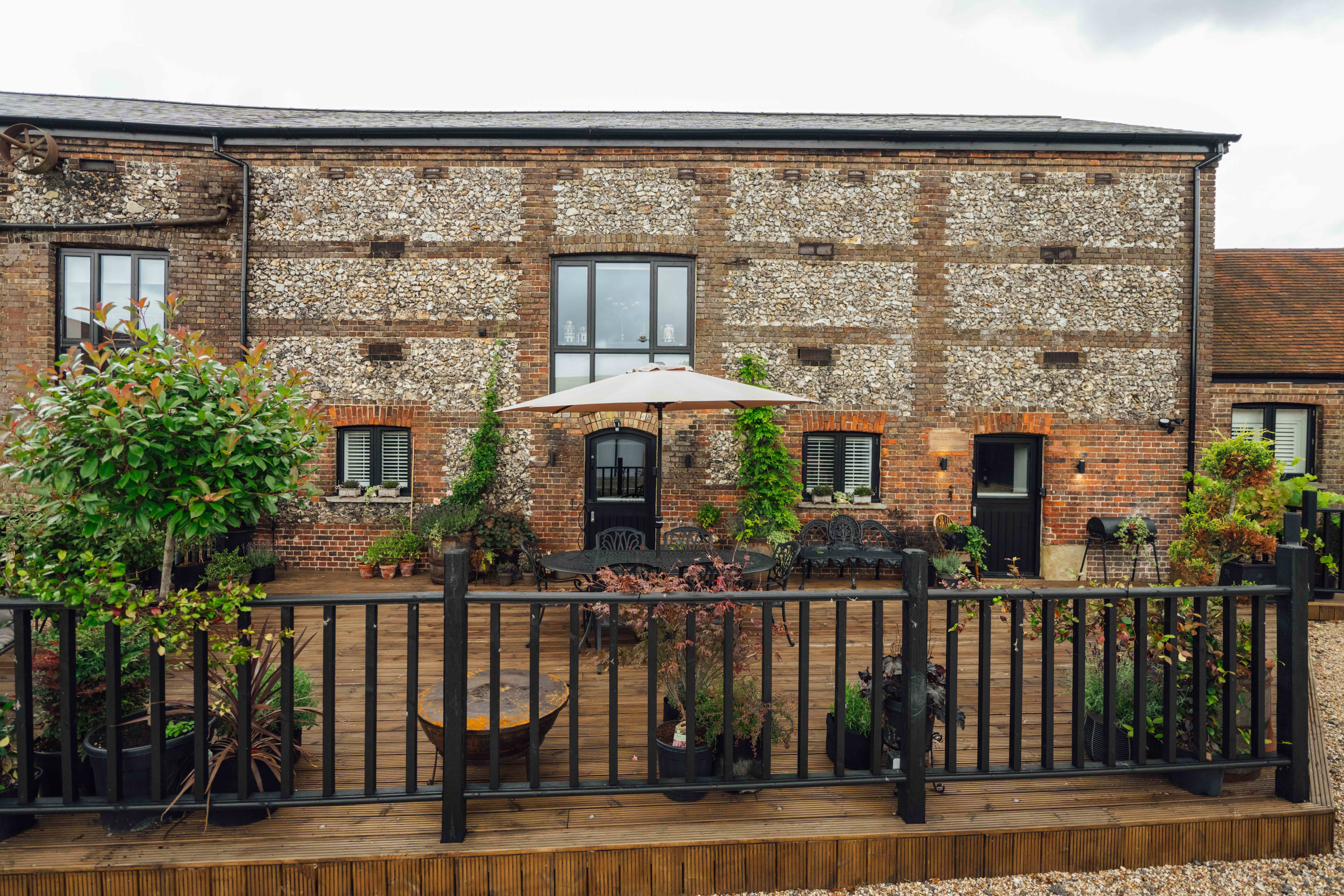 Luxury Bunkers Barn venue with rustic exterior, ideal for outdoor events and gatherings.