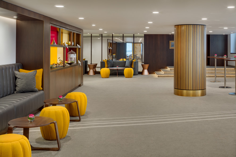 Modern lobby of Kempinski Hotel Corvinus Budapest, ideal for networking and meetings.