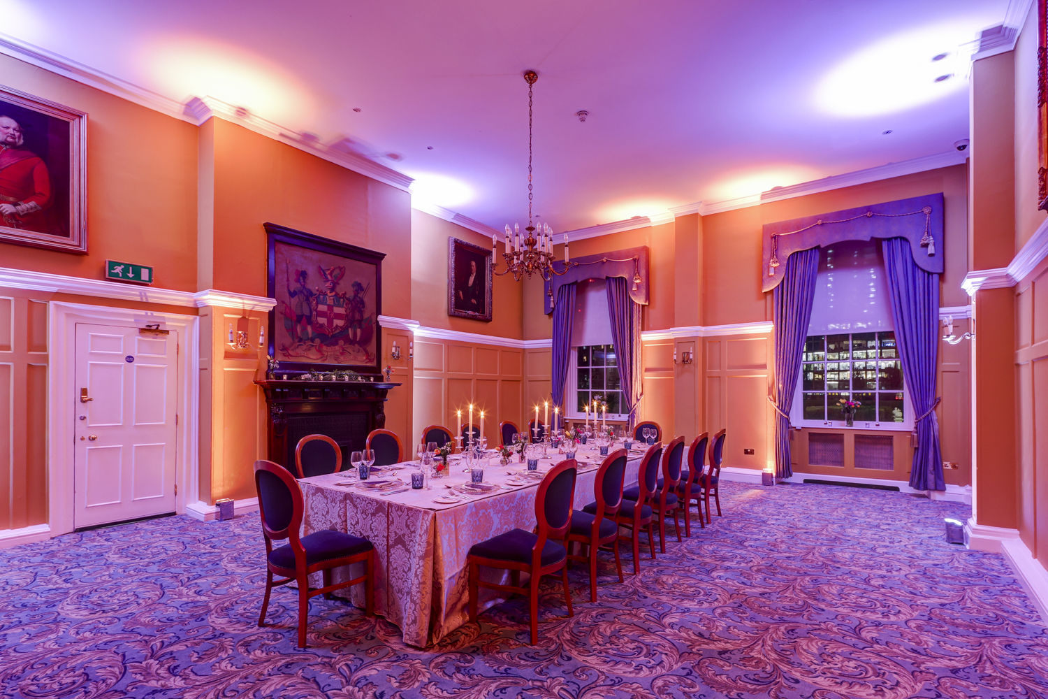 Elegant Queen's Room at HAC, perfect for upscale dinners and intimate gatherings.