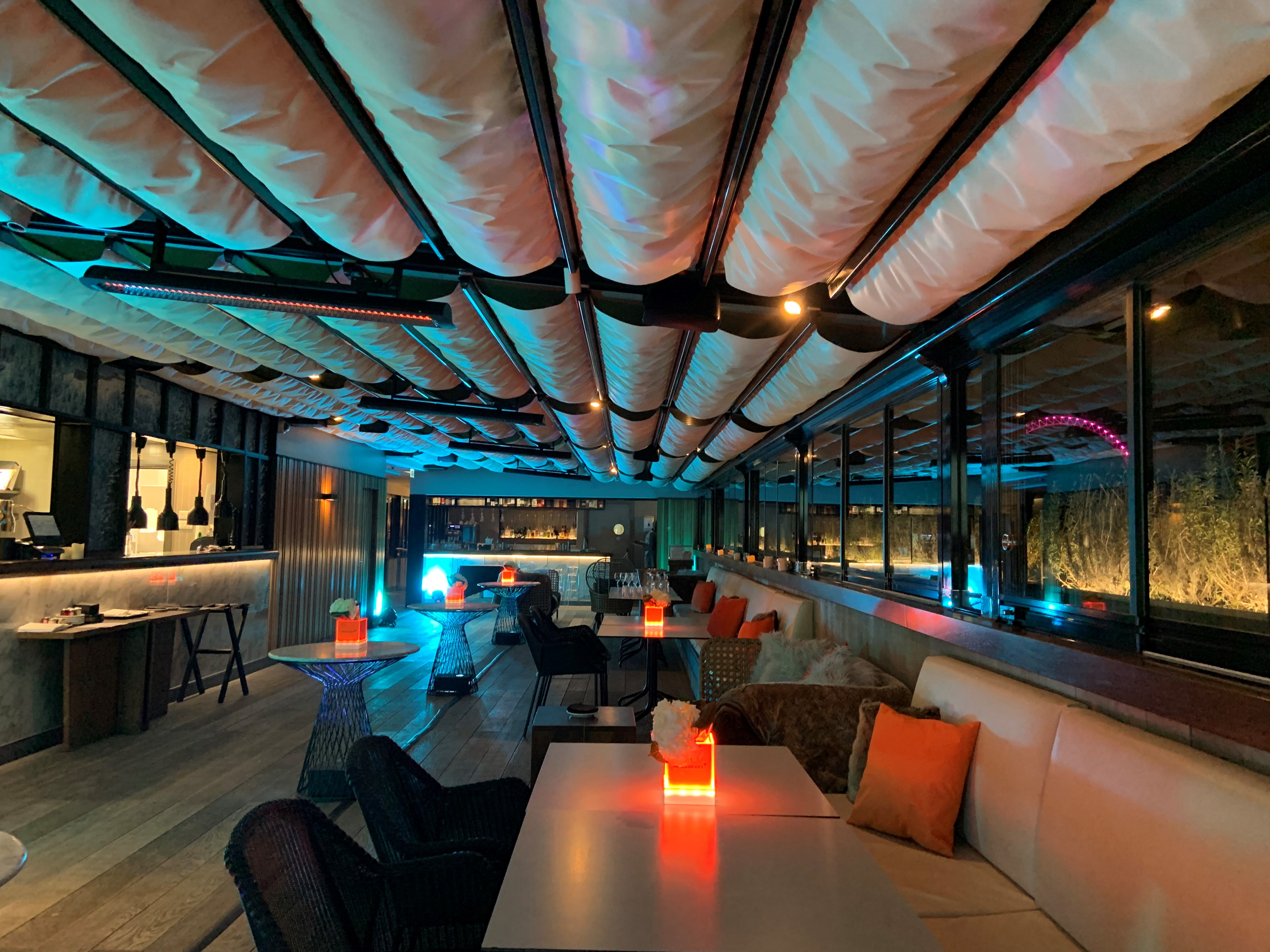 Christmas party at Trafalgar St James Rooftop with stylish design and ambient lighting.