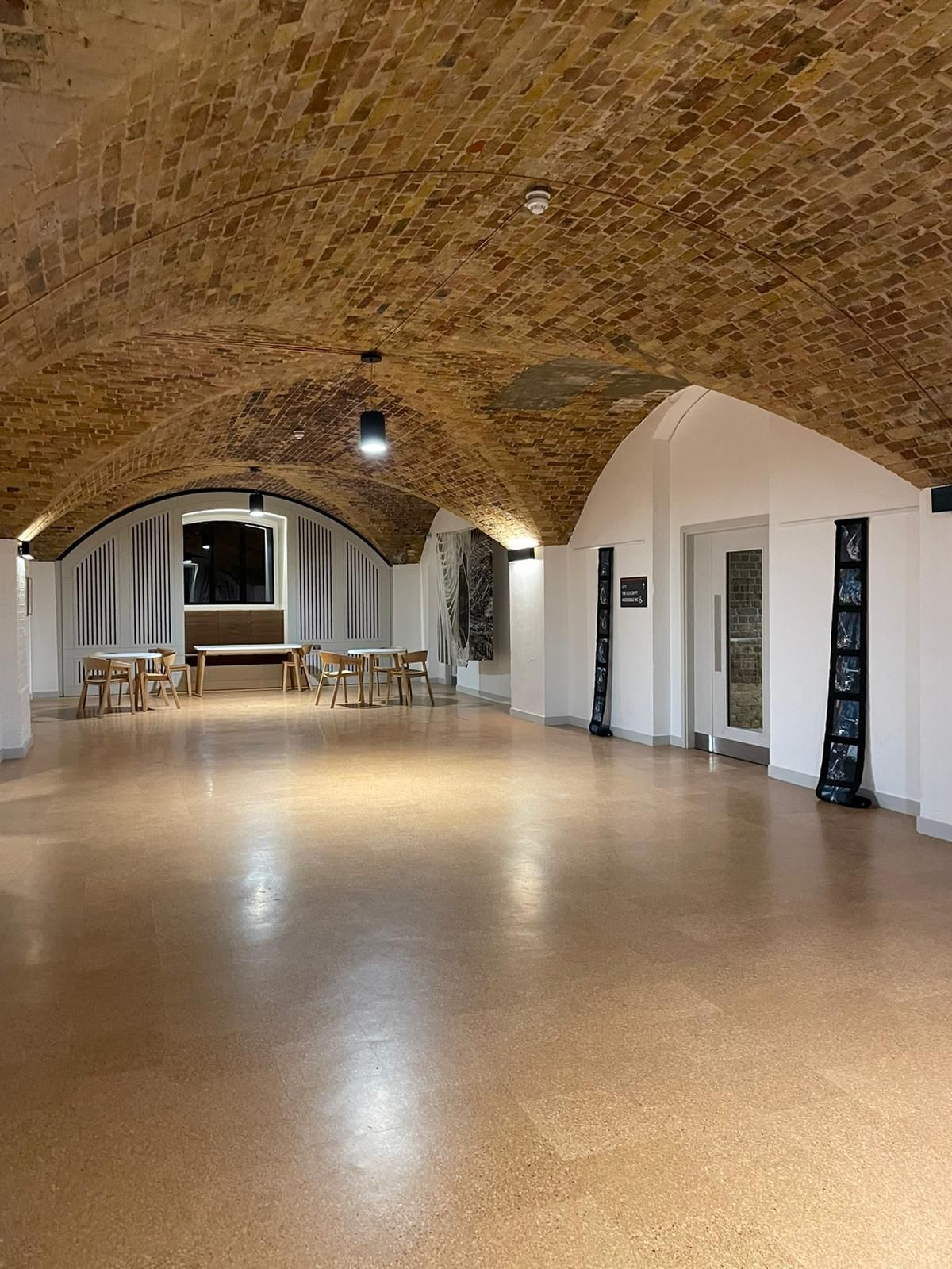 Event space at St John's Church, featuring an arched ceiling for gatherings and meetings.