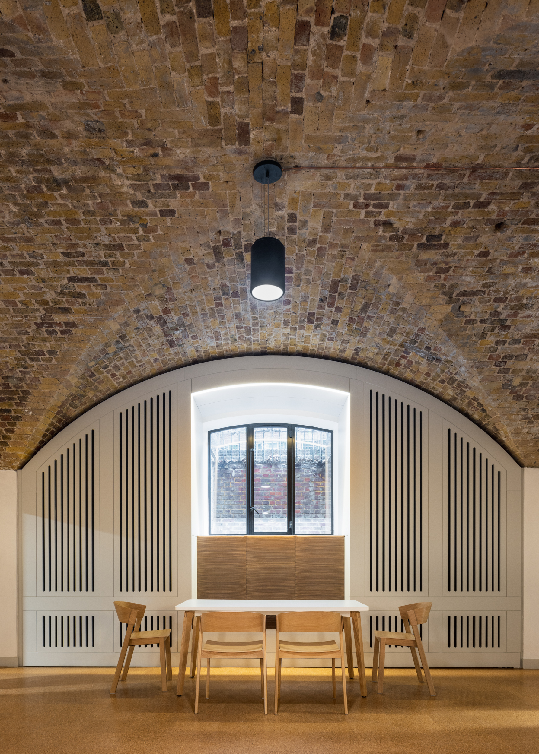 Stylish event space at THE FORUM St John's Church with brick arch ceiling for gatherings.
