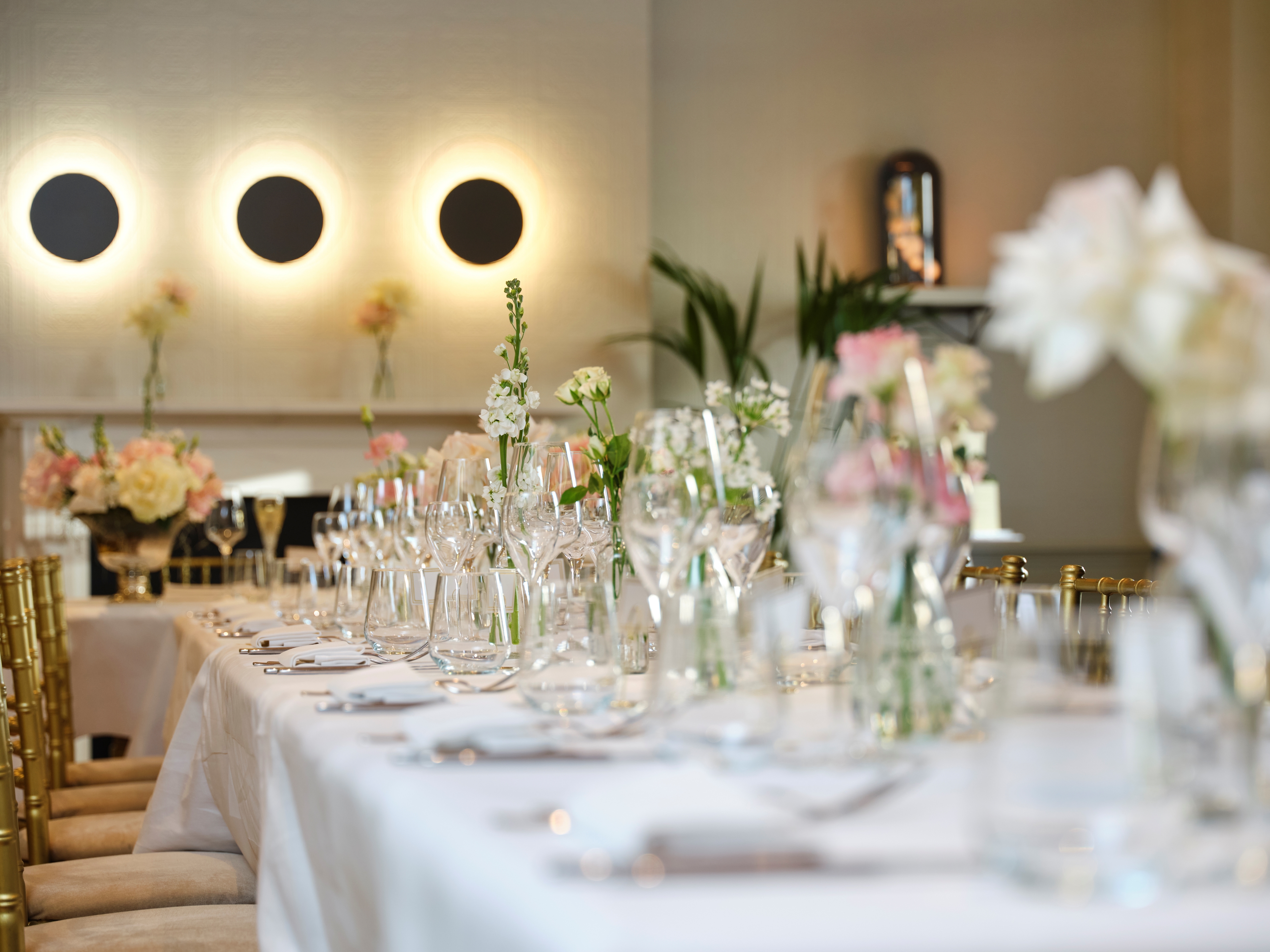 Elegant dining table with floral centerpieces at Cento, 100 Queen's Gate Hotel London.