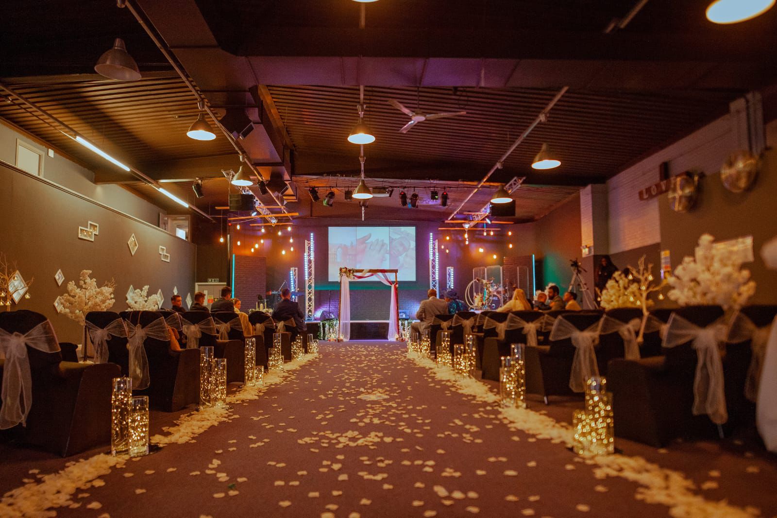 Large Function Hall in Manchester, elegant seating, perfect for conferences and ceremonies.