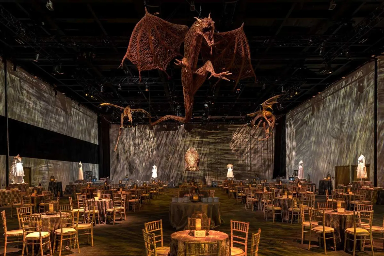 Banquet Hall at ICC Belfast with dragon sculptures for fantasy-themed events.