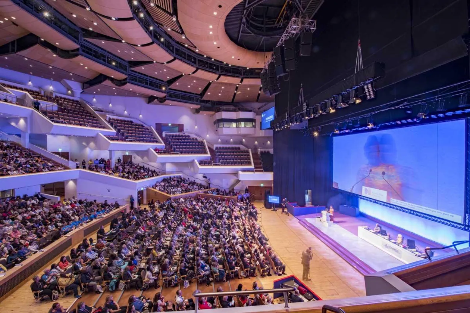 Main Auditorium in ICC Belfast with tiered seating for impactful conferences and events.