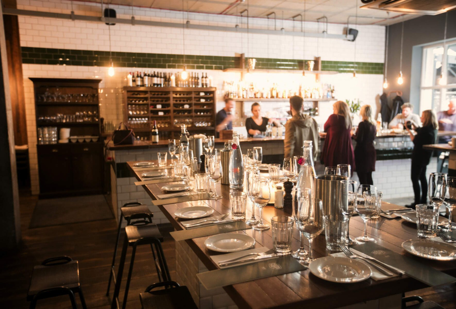 Flame Restaurant in ICC Belfast, elegant table setting for intimate events and networking.