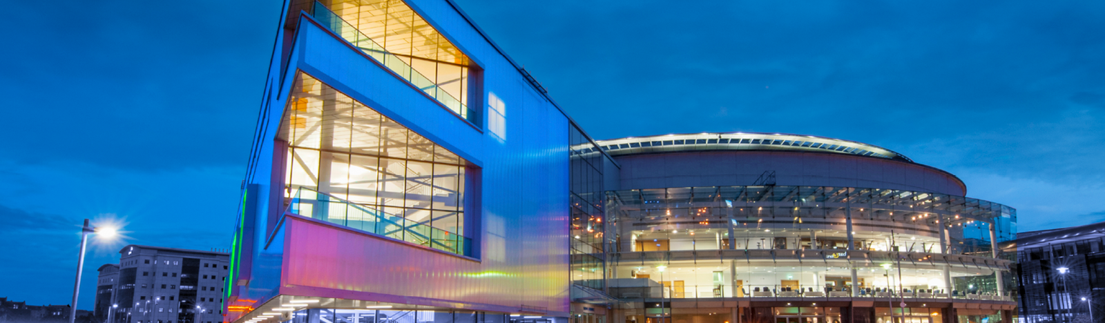 Granny Annies at ICC Belfast, modern venue with glass windows for conferences and gatherings.