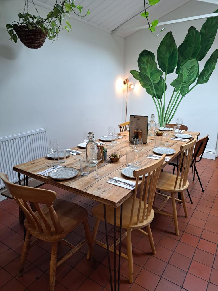 Intimate dining setup with rustic decor at Spinach East Dulwich for private events.