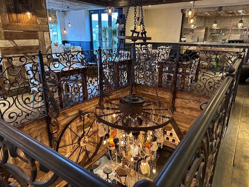 Elegant venue with wrought iron railings, perfect for gatherings and celebrations.