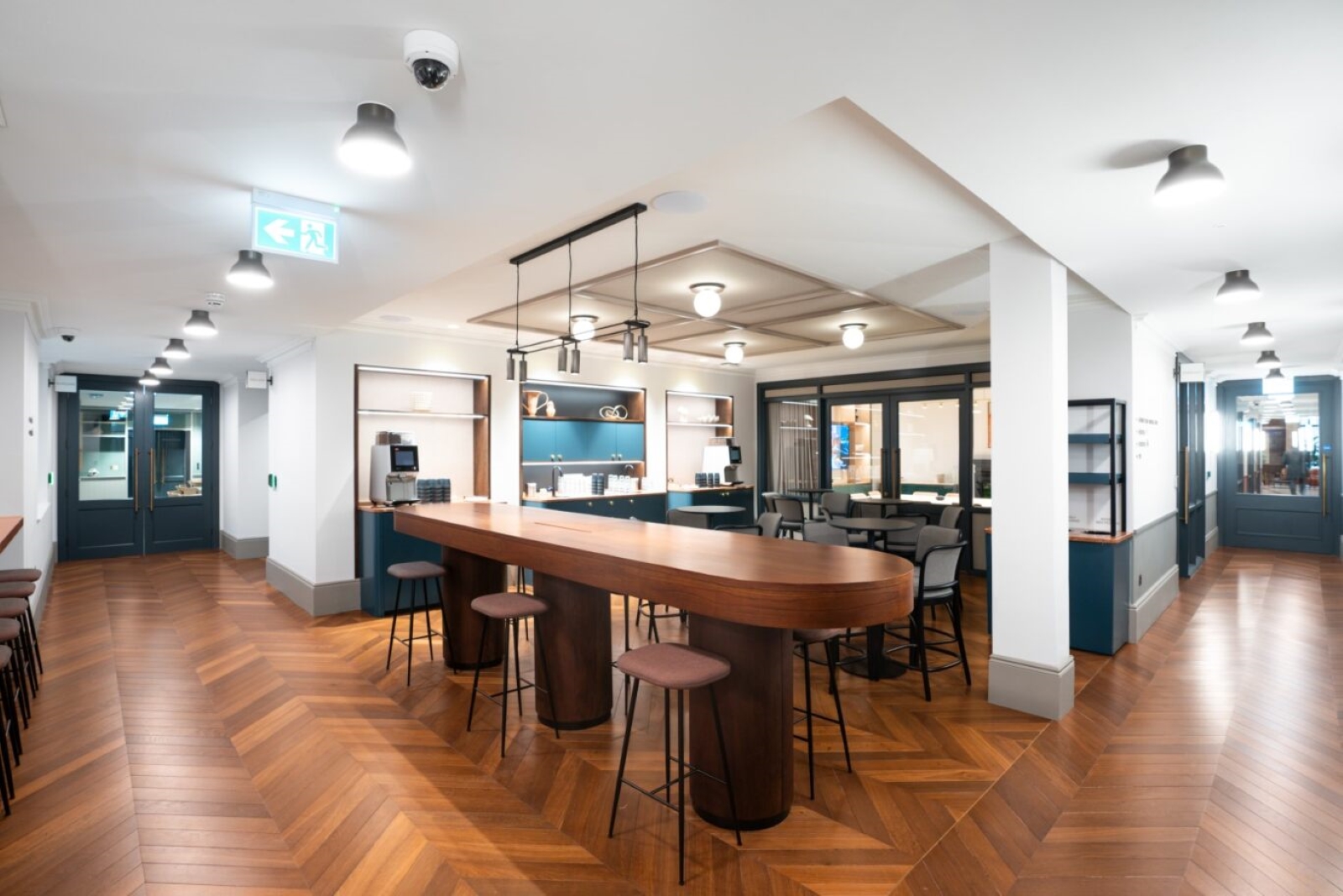 Modern meeting space at Salisbury House with stylish bar table for networking events.