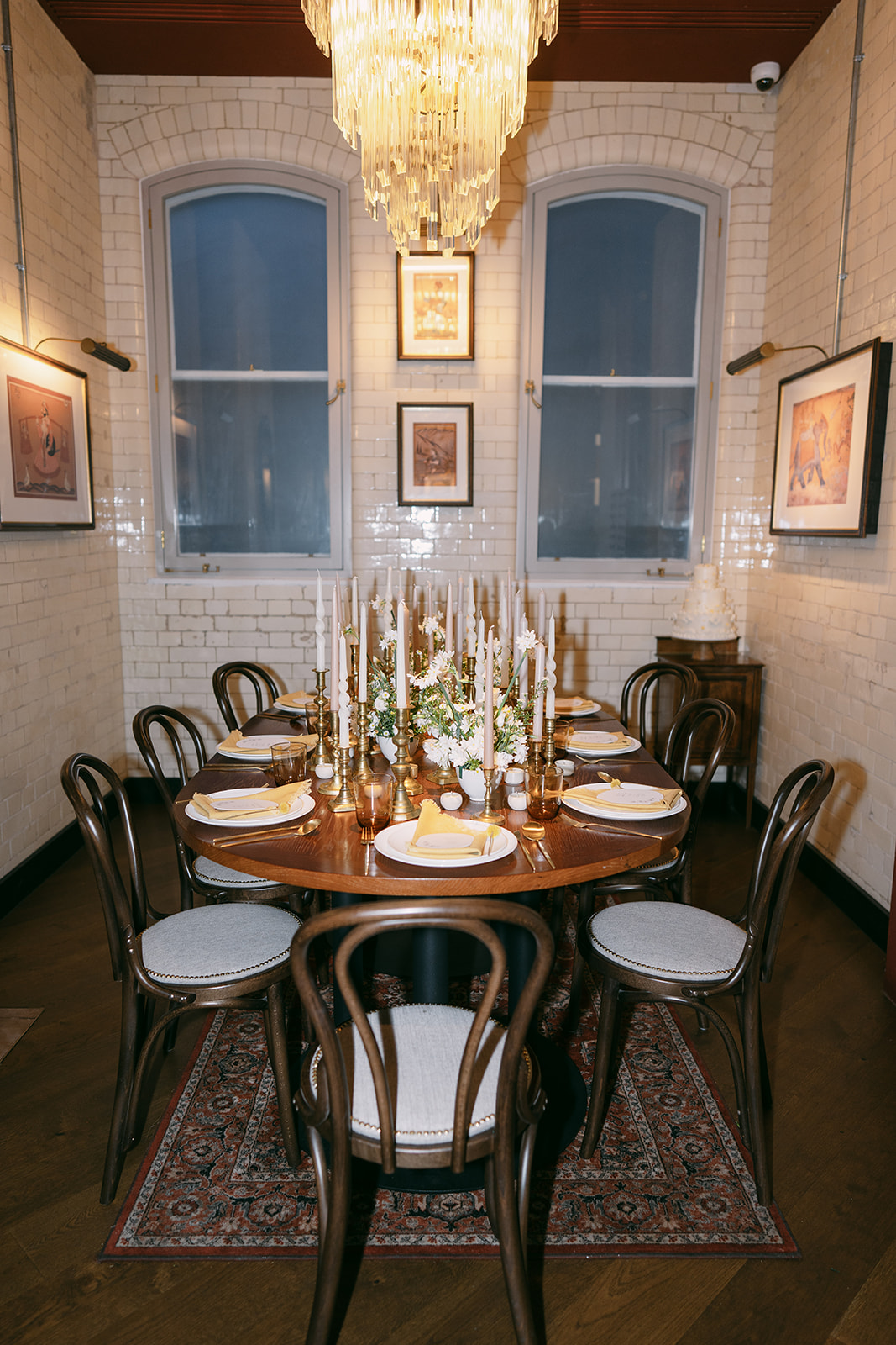 Elegant dining table with candles in The Watch Room, perfect for upscale events.