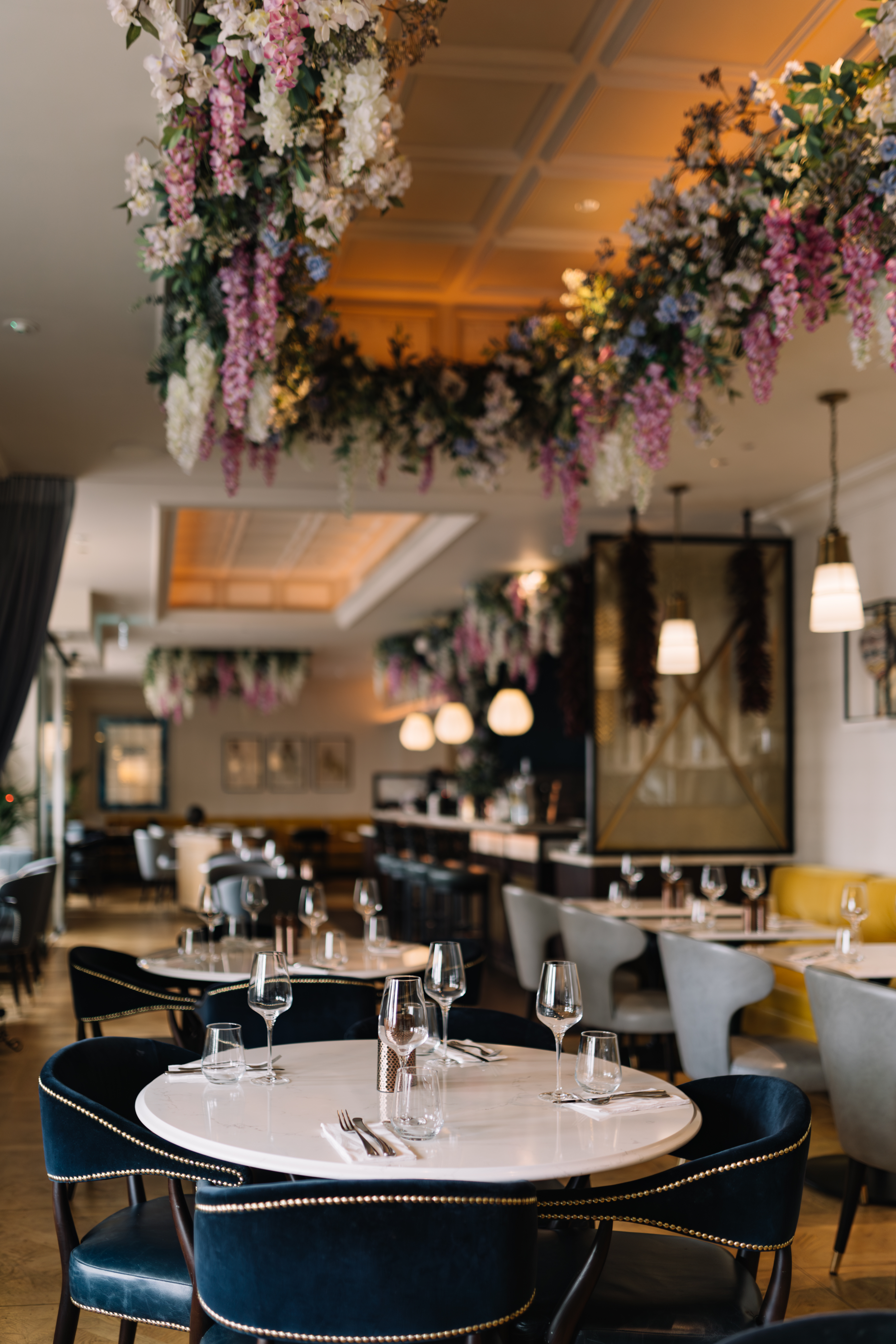 Elegant restaurant at Cento, 100 Queen's Gate Hotel, ideal for upscale events and gatherings.