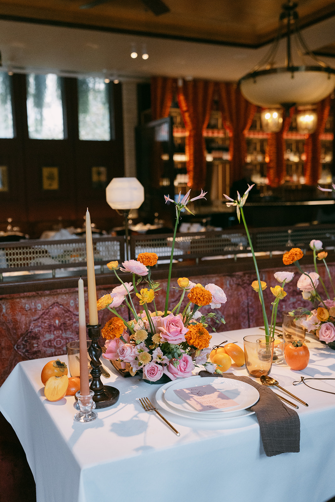 Elegant table setting with floral centerpiece for upscale events at Yaatra Restaurant.
