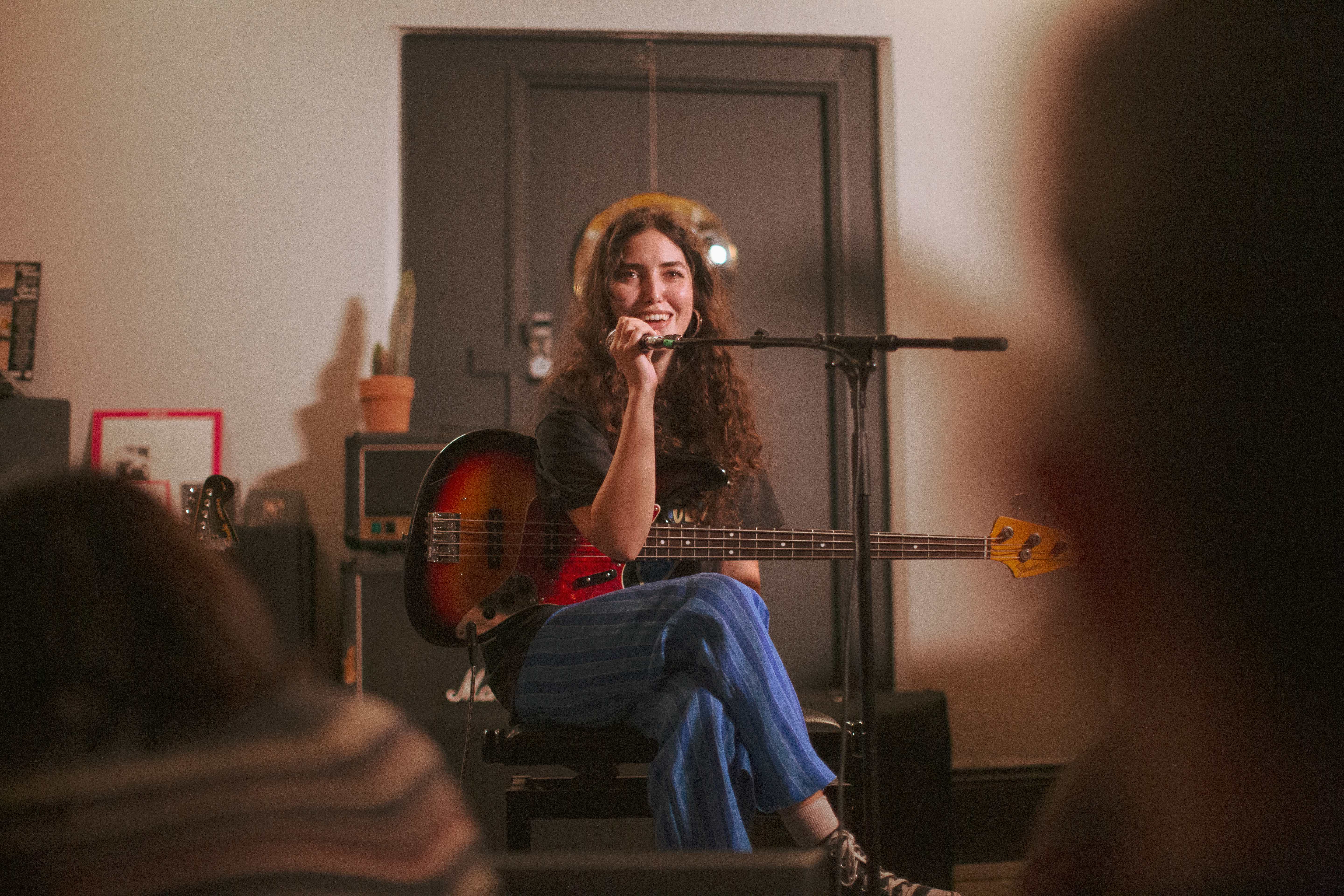 Intimate live performance at The Crypt Studio with cozy atmosphere and engaging artist.