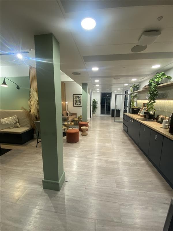 Modern event space at Fulwood Place with greenery, ideal for networking and meetings.