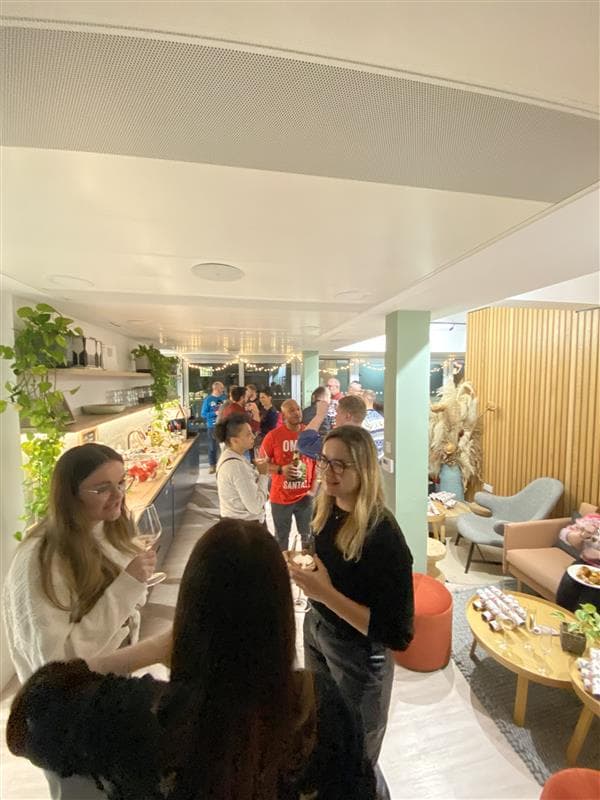 Vibrant networking event at Fulwood Place with buffet setup and modern decor.