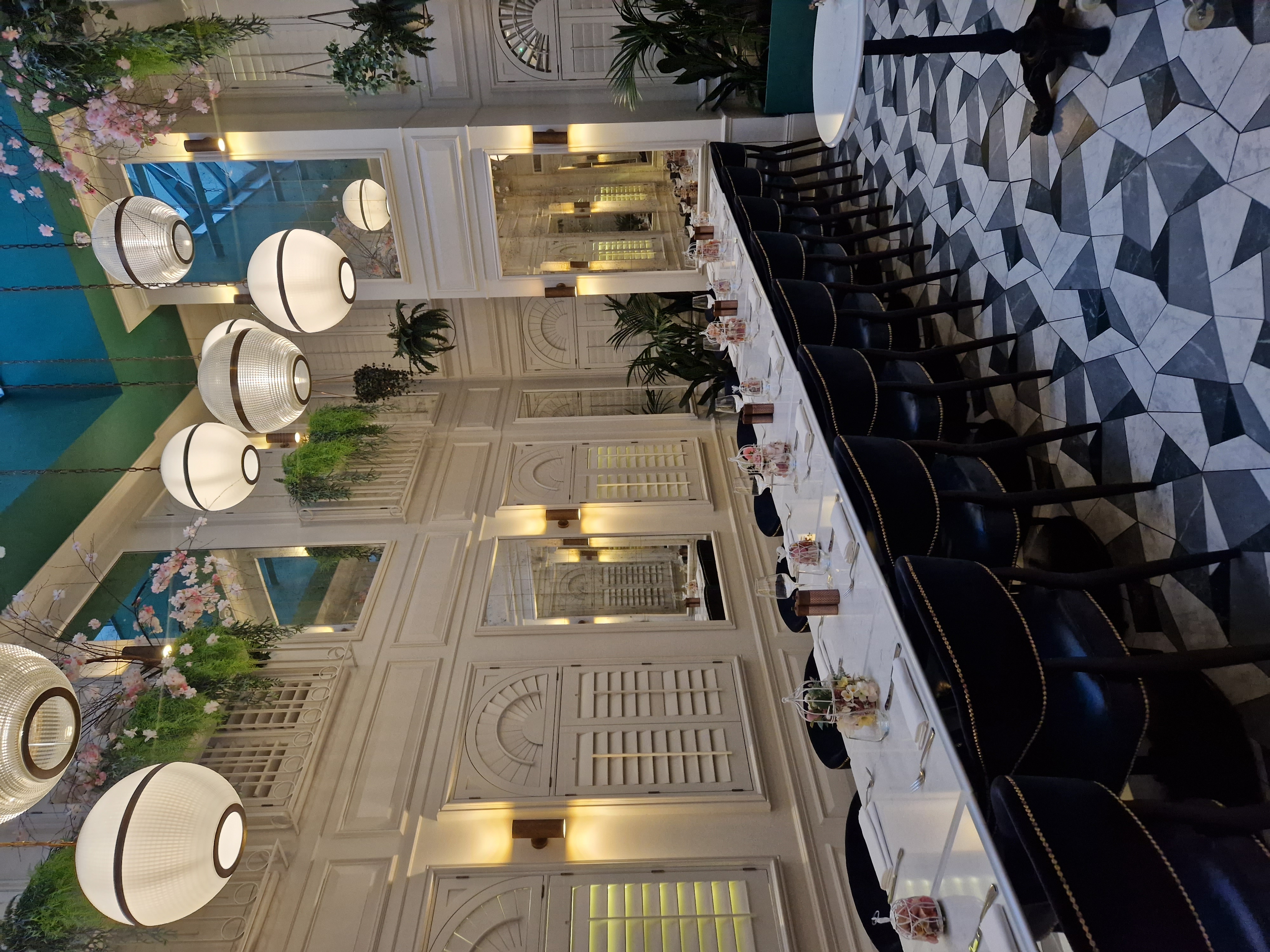 Elegant dining space at Botanica, 100 Queen's Gate Hotel, ideal for events and gatherings.