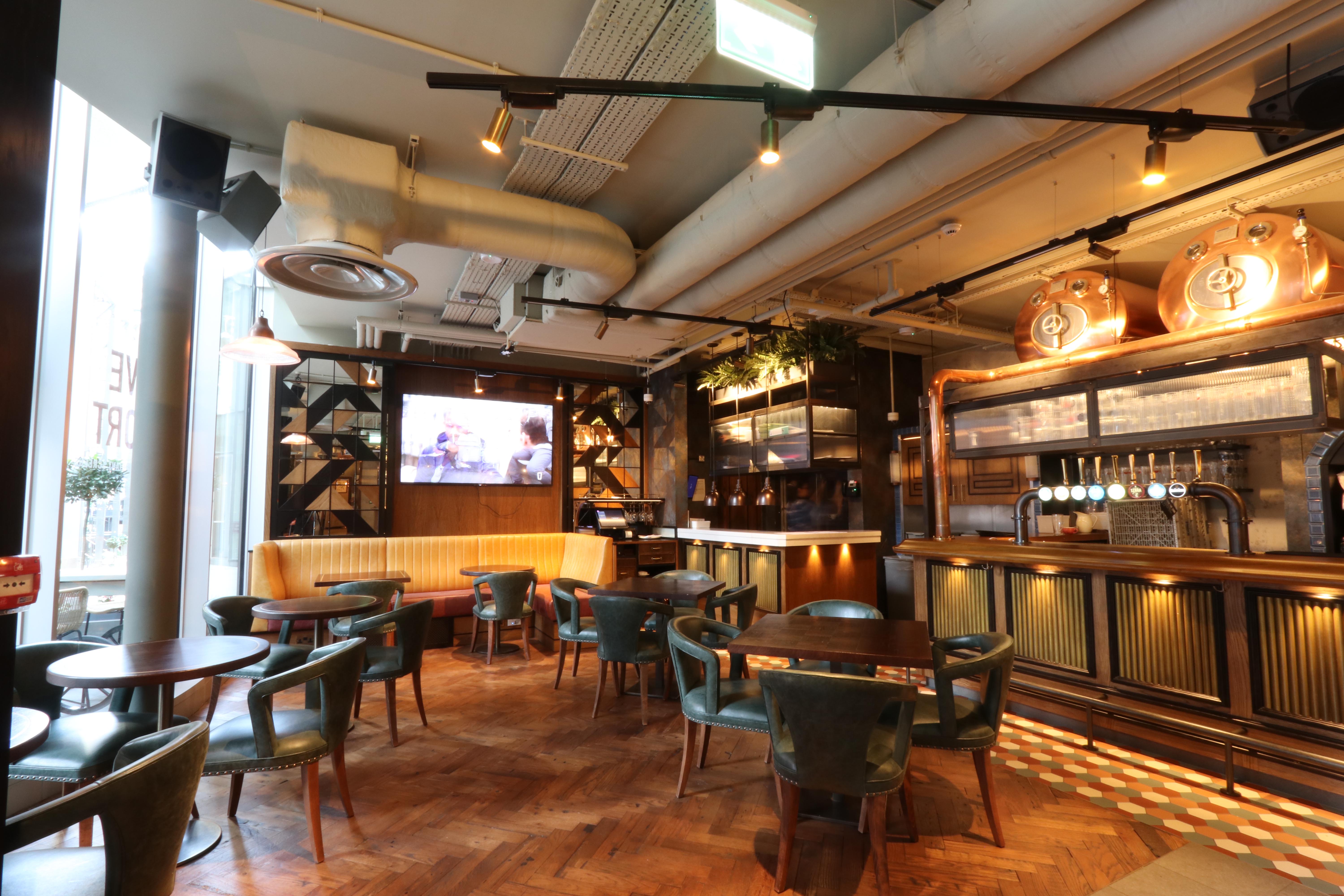 Stylish Broadleaf venue with warm lighting, ideal for intimate gatherings and meetings.