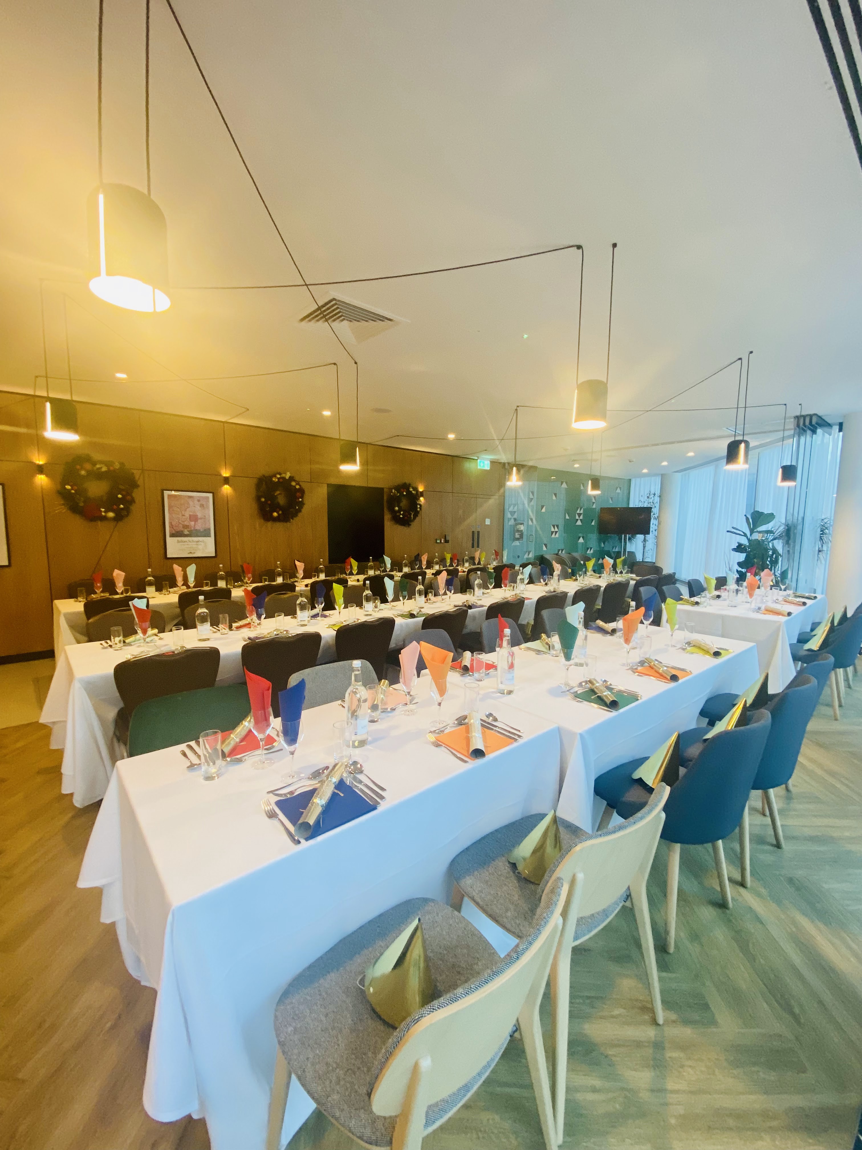 Formal event space at Cavell St Kitchen, Holiday Inn Whitechapel, with elegant table settings.