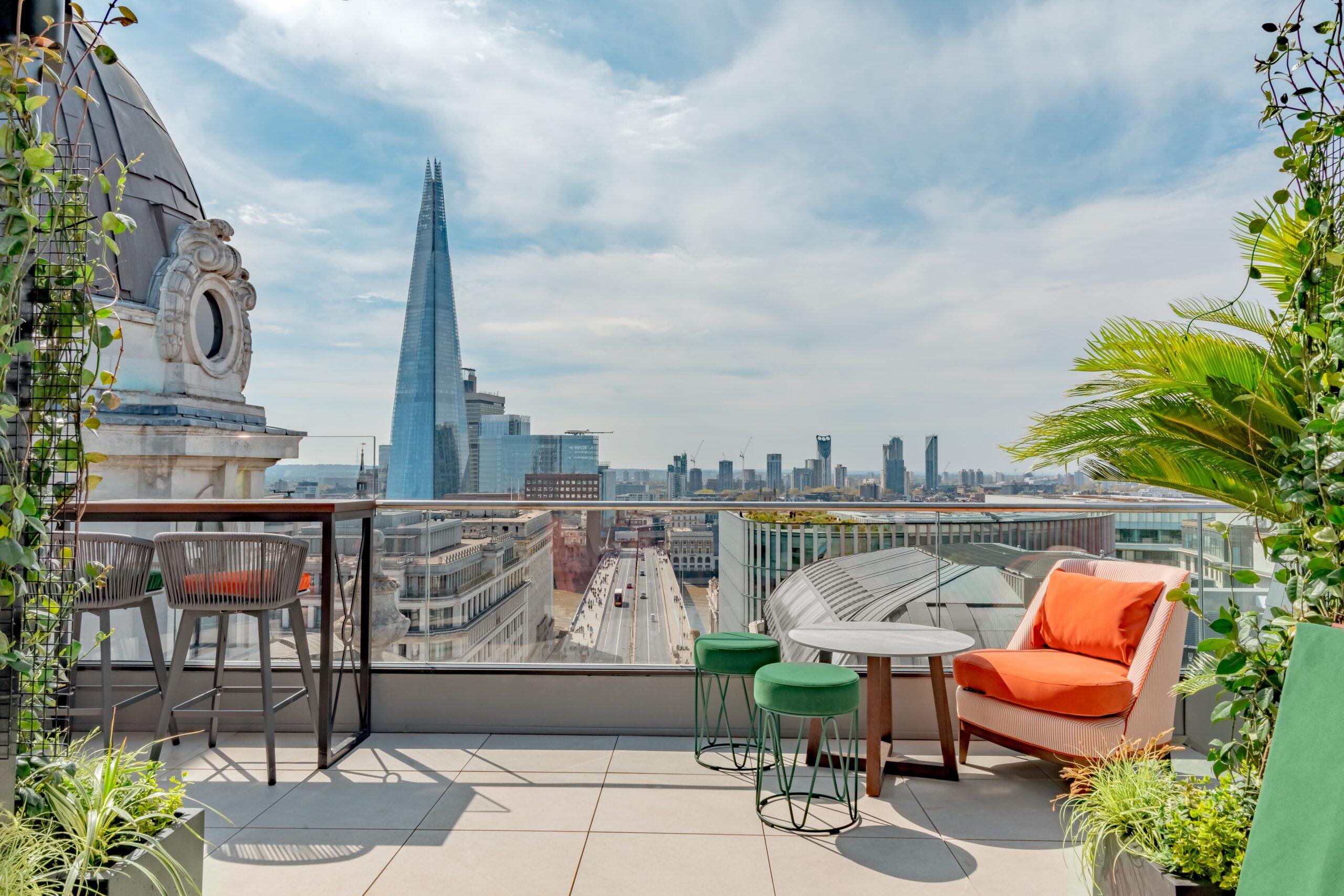 Rooftop bar at The Opera with panoramic views for upscale meetings and events.
