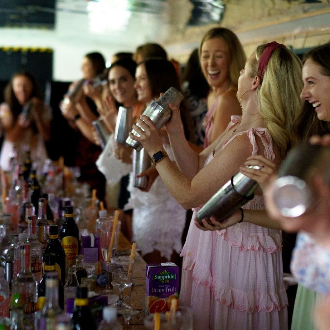 Mary Read Boat event in Hackney Wick with participants shaking cocktails, ideal for team-building.