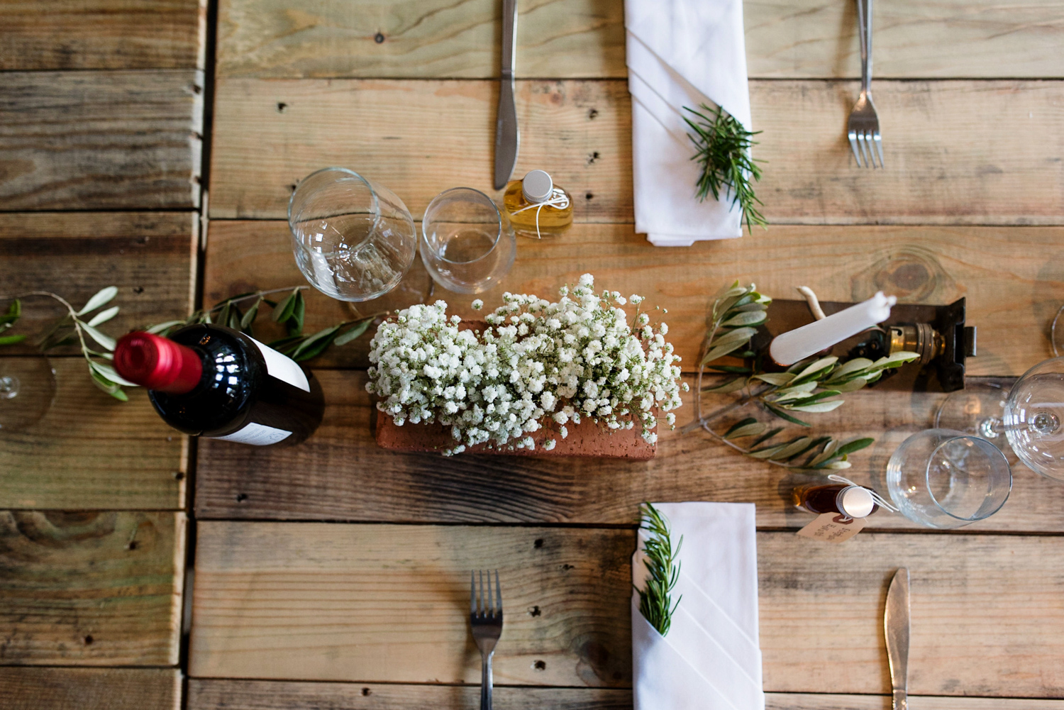 Elegant table setting with floral centerpieces for intimate gatherings at Mary Read Boat.