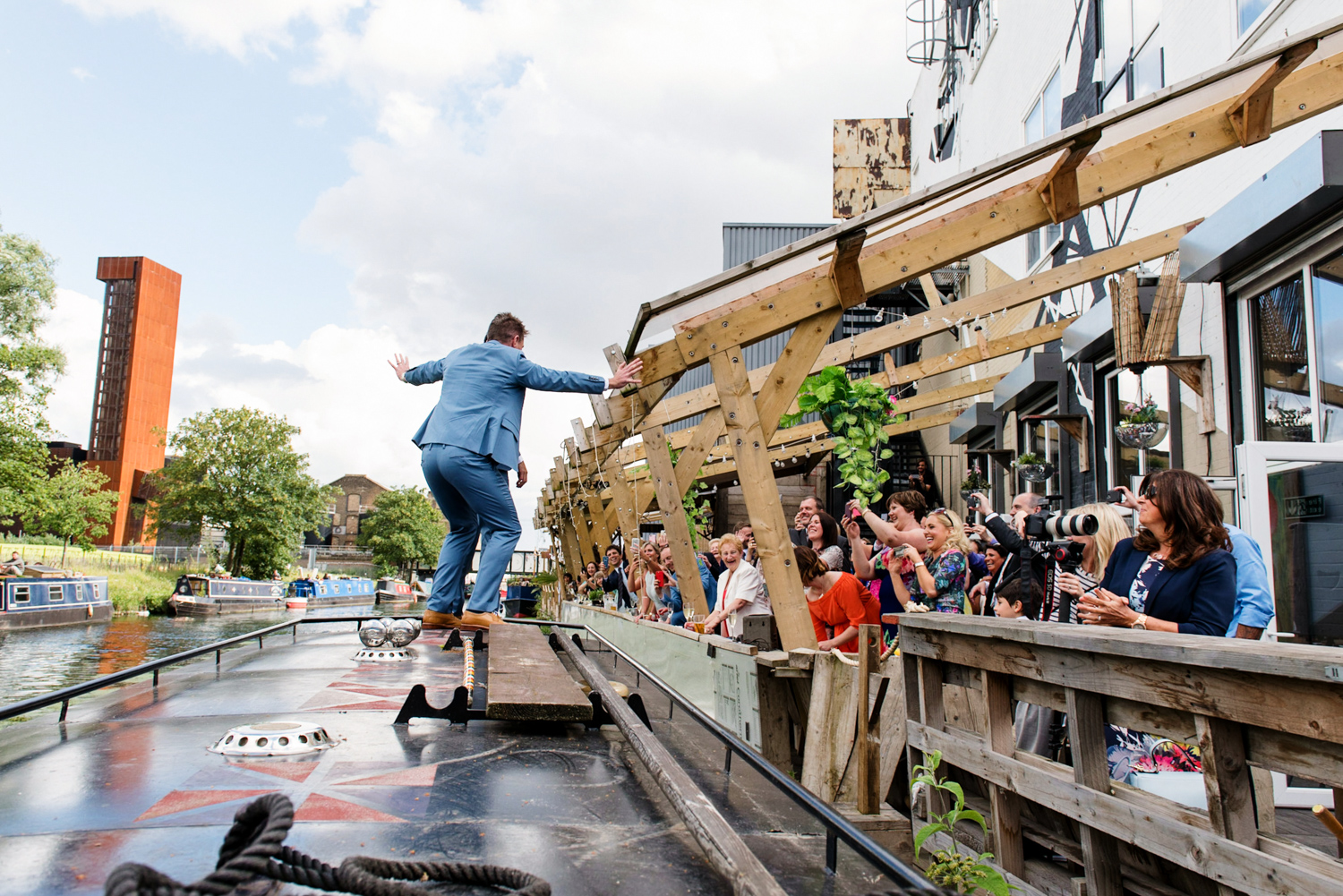 Outdoor networking event at Mary Read Boat, lively speaker by canal.