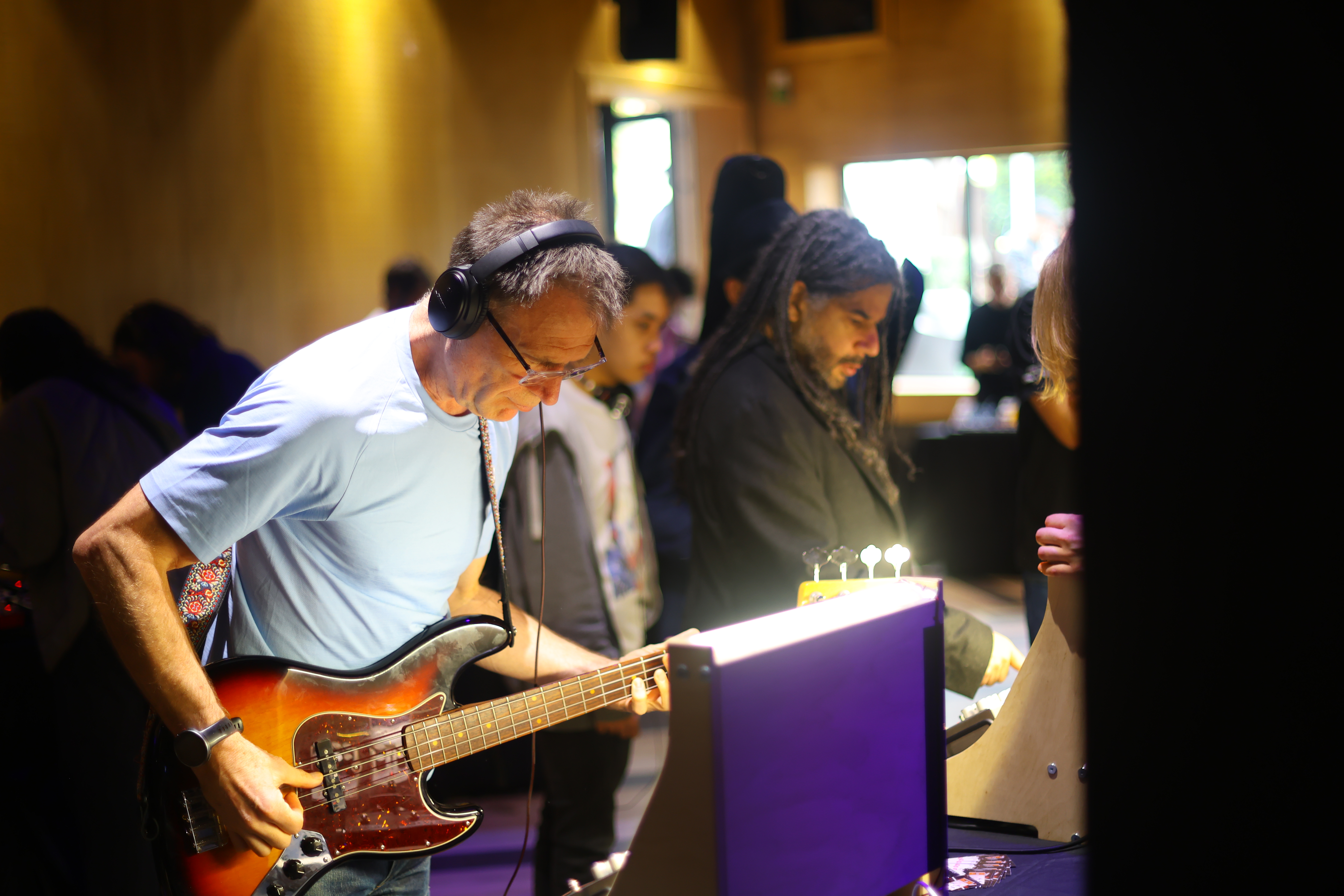 Musician rehearsing with electric guitar at a creative event in Hackney Wick.