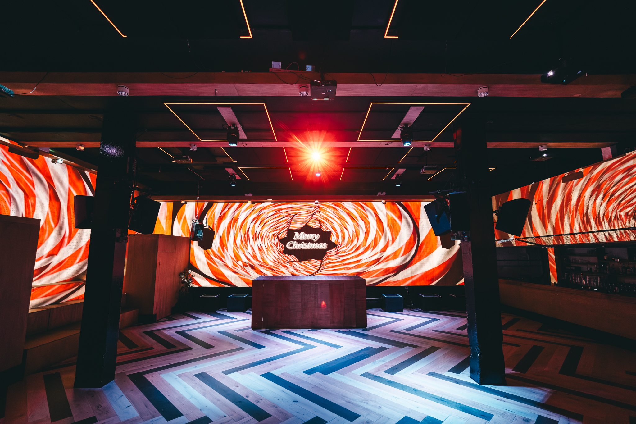 Christmas at No90 Hackney Wick with vibrant projections for festive celebrations.