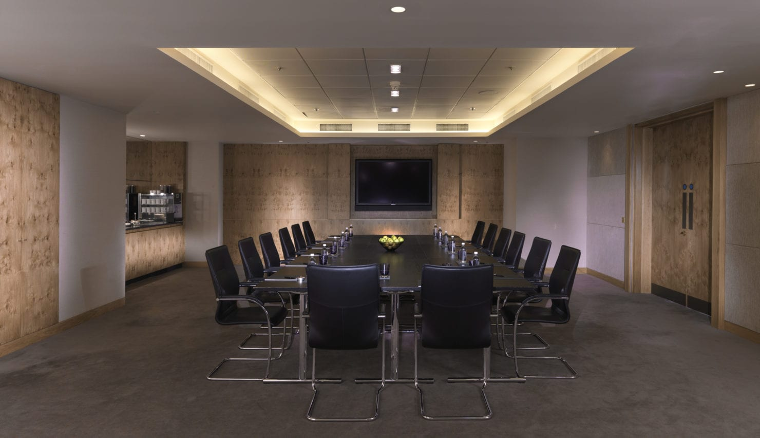 London upscale boardroom meeting AV