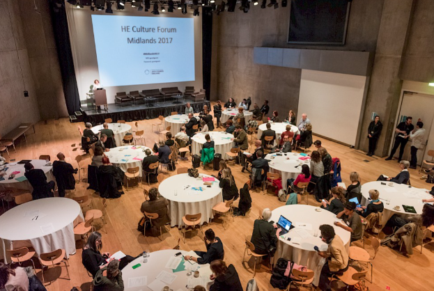 Conference setting at Nottingham Contemporary with round tables for networking and collaboration.