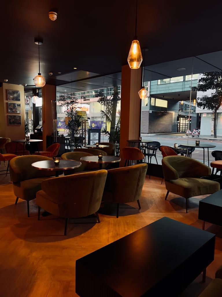 Stylish modern venue with cozy seating for intimate meetings and networking events.